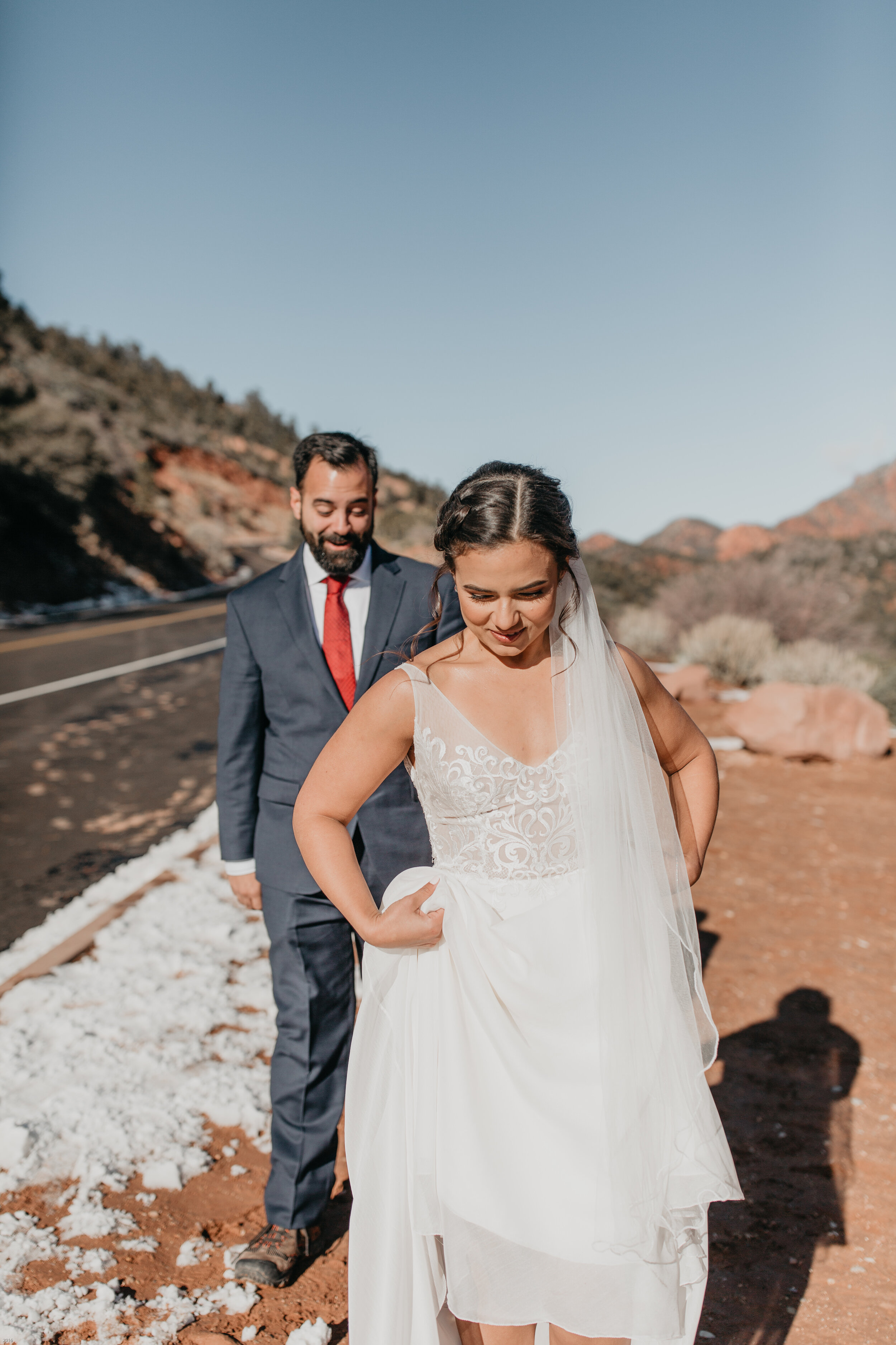 Nicole-Daacke-Photography-snowy-hiking-elopement-in-zion-national-park-zion-elopement-photographer-canyon-overlook-trial-brial-portraits-in-mt-zion-national-park-utah-desert-adventure-elopement-photographer-107.jpg