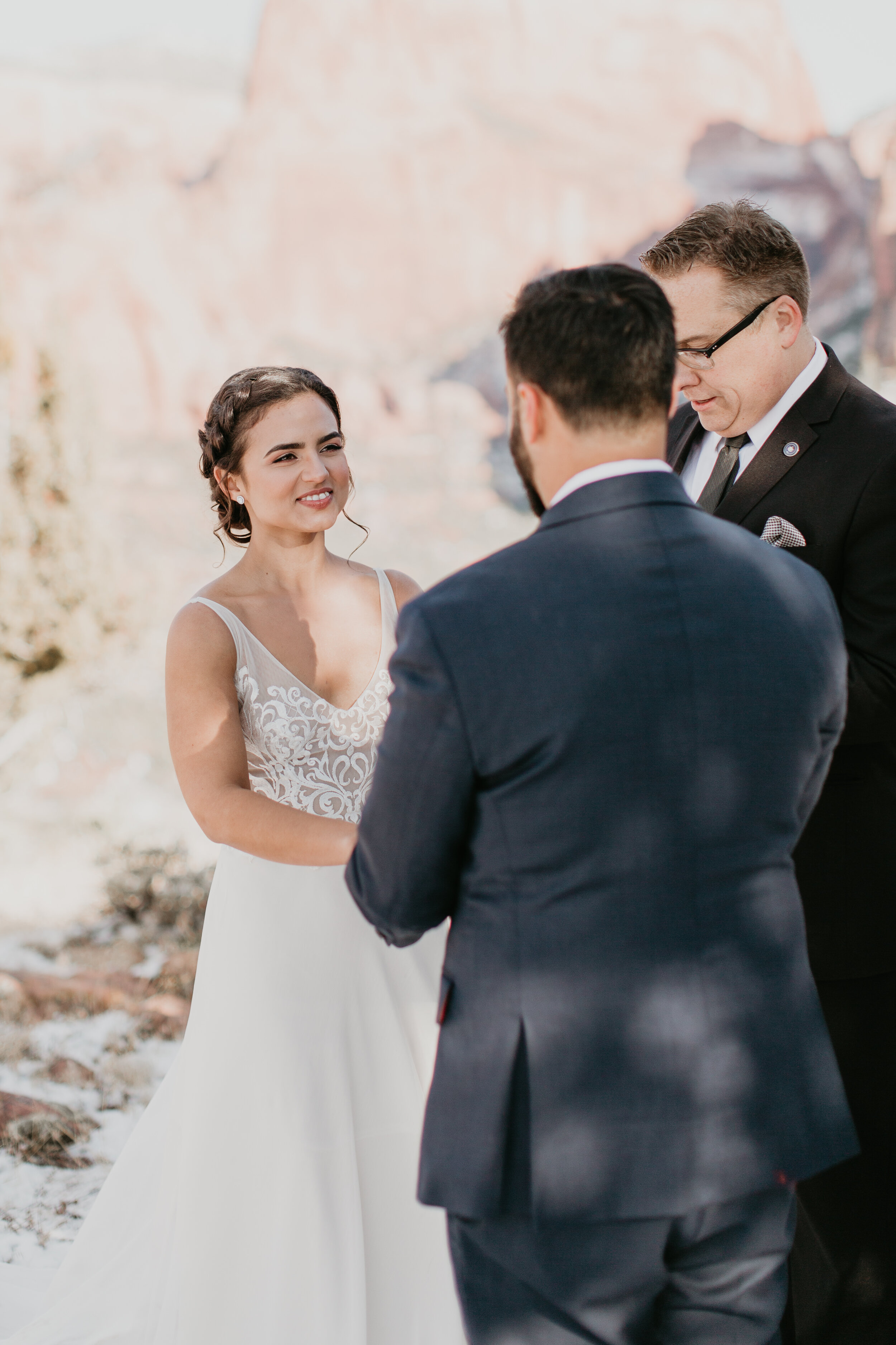 Nicole-Daacke-Photography-snowy-hiking-elopement-in-zion-national-park-zion-elopement-photographer-canyon-overlook-trial-brial-portraits-in-mt-zion-national-park-utah-desert-adventure-elopement-photographer-111.jpg