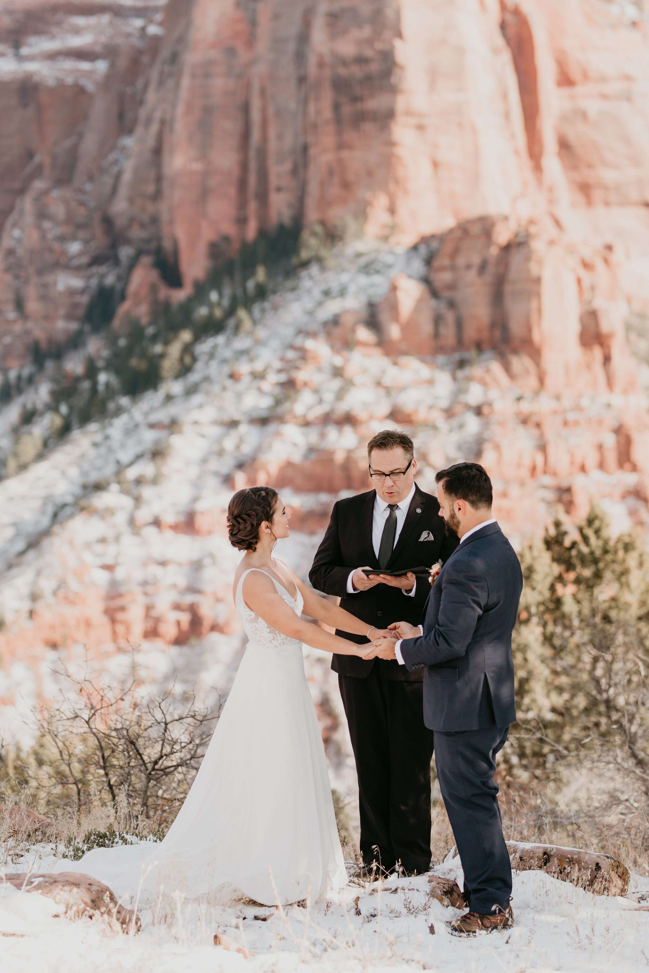 Nicole-Daacke-Photography-snowy-hiking-elopement-in-zion-national-park-zion-elopement-photographer-canyon-overlook-trial-brial-portraits-in-mt-zion-national-park-utah-desert-adventure-elopement-photographer-115.jpg