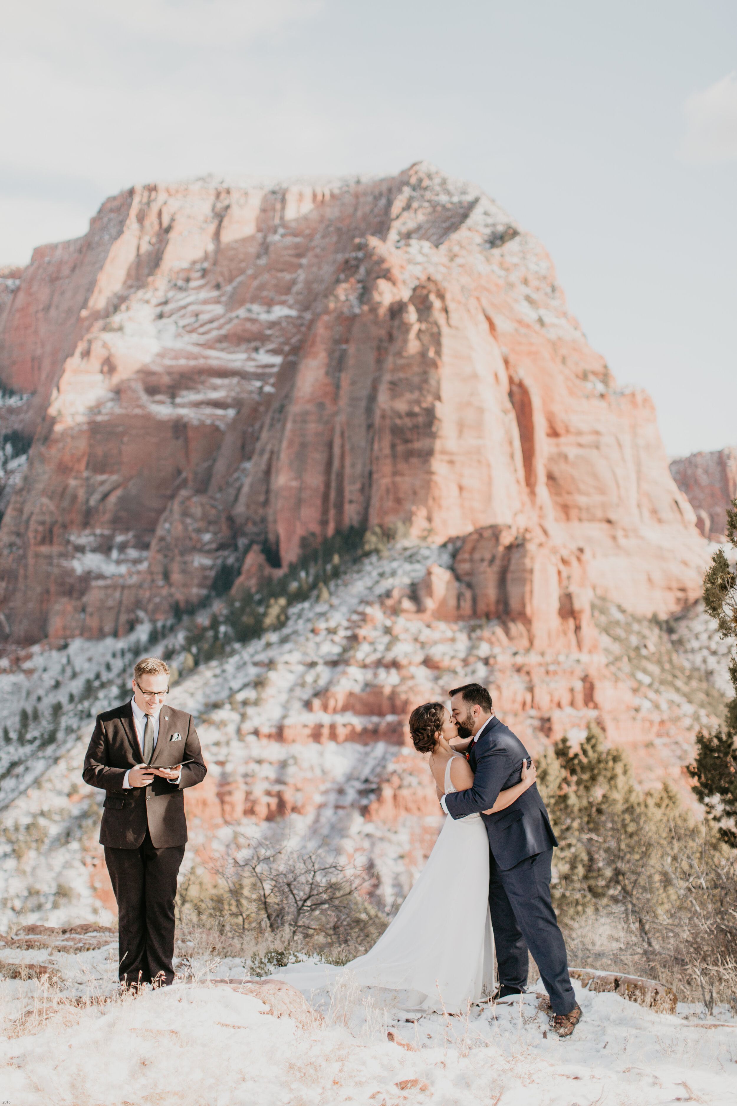 Nicole-Daacke-Photography-snowy-hiking-elopement-in-zion-national-park-zion-elopement-photographer-canyon-overlook-trial-brial-portraits-in-mt-zion-national-park-utah-desert-adventure-elopement-photographer-128.jpg