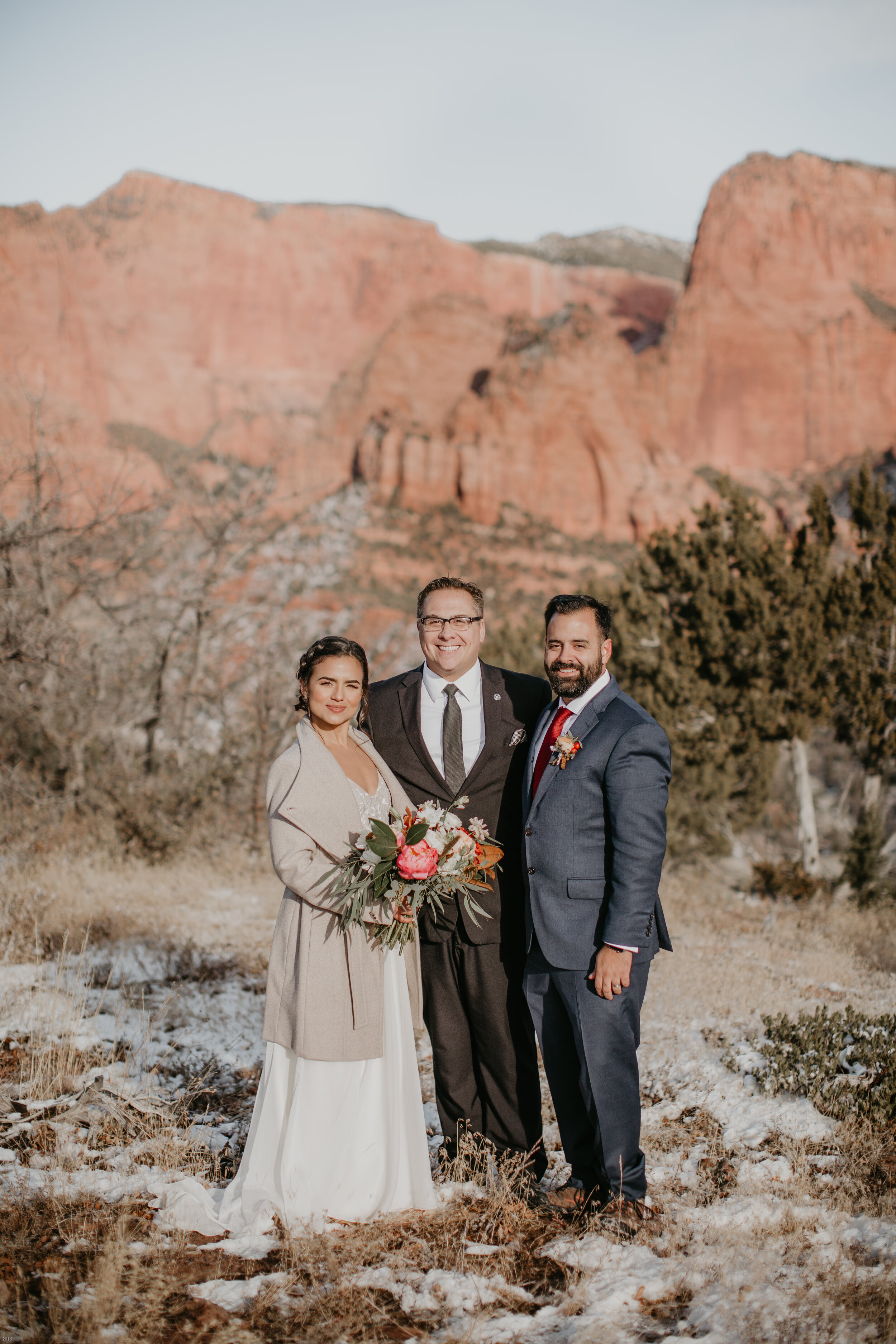 Nicole-Daacke-Photography-snowy-hiking-elopement-in-zion-national-park-zion-elopement-photographer-canyon-overlook-trial-brial-portraits-in-mt-zion-national-park-utah-desert-adventure-elopement-photographer-132.jpg