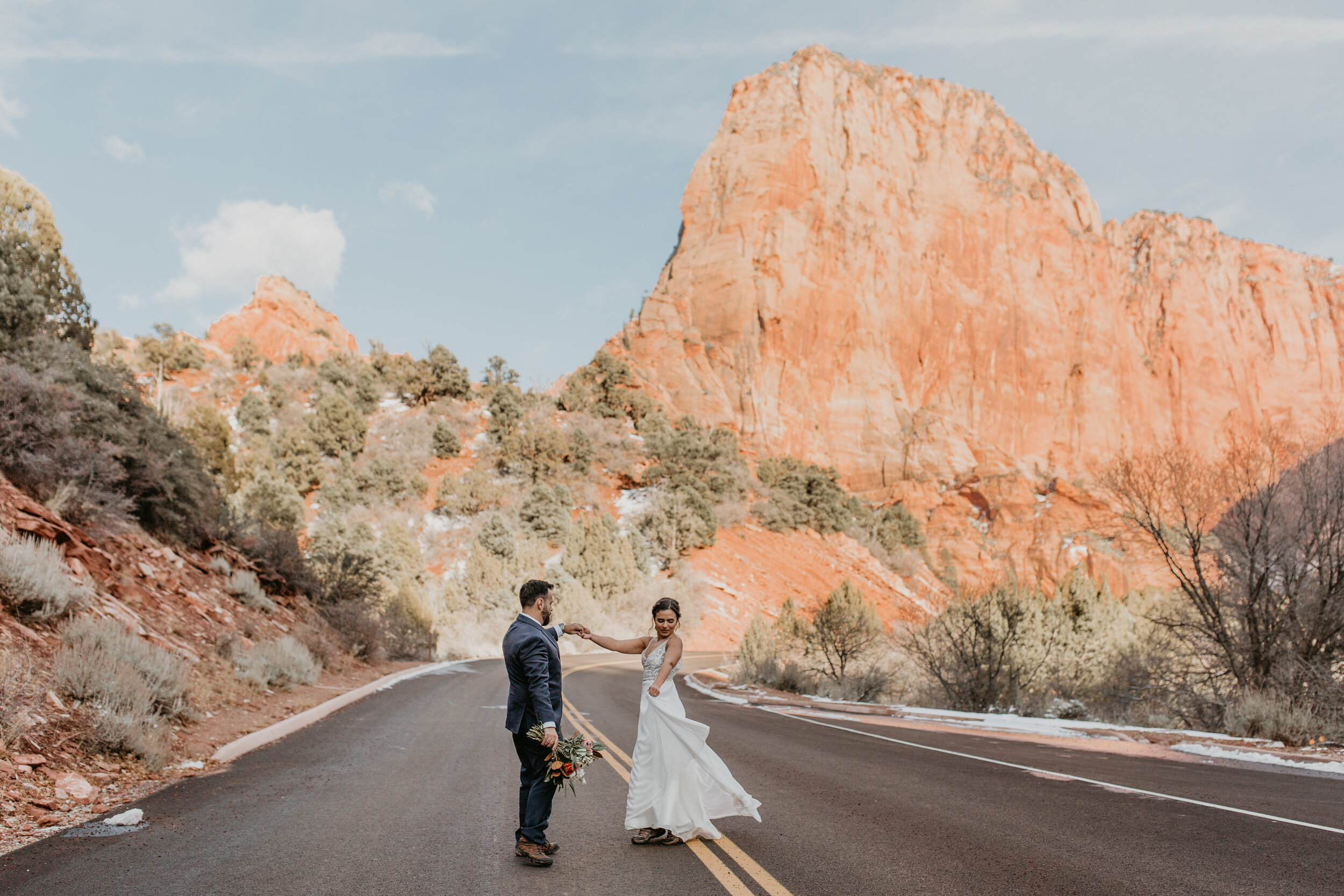 Nicole-Daacke-Photography-snowy-hiking-elopement-in-zion-national-park-zion-elopement-photographer-canyon-overlook-trial-brial-portraits-in-mt-zion-national-park-utah-desert-adventure-elopement-photographer-136.jpg