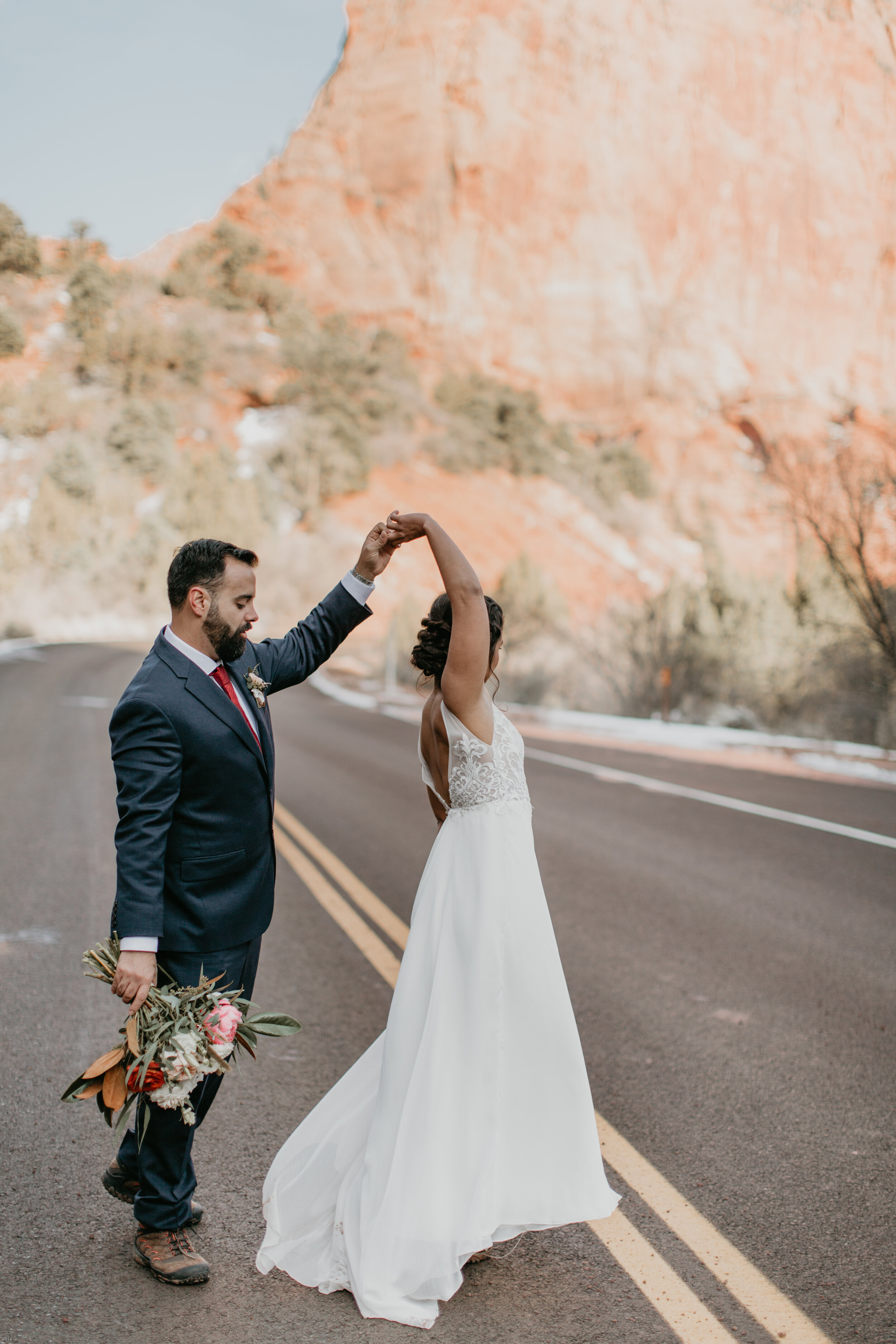 Nicole-Daacke-Photography-snowy-hiking-elopement-in-zion-national-park-zion-elopement-photographer-canyon-overlook-trial-brial-portraits-in-mt-zion-national-park-utah-desert-adventure-elopement-photographer-138.jpg