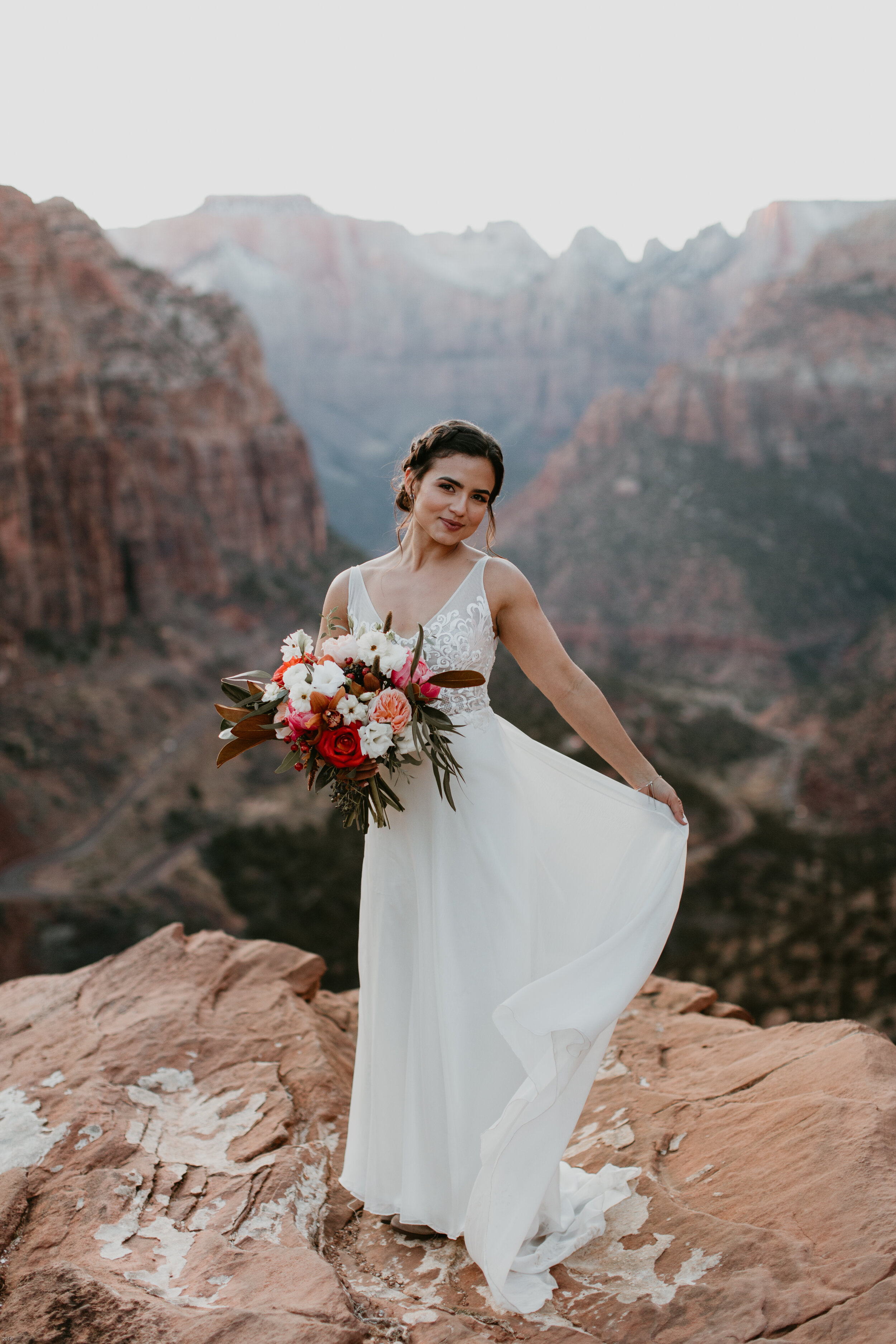 Nicole-Daacke-Photography-snowy-hiking-elopement-in-zion-national-park-zion-elopement-photographer-canyon-overlook-trial-brial-portraits-in-mt-zion-national-park-utah-desert-adventure-elopement-photographer-145.jpg