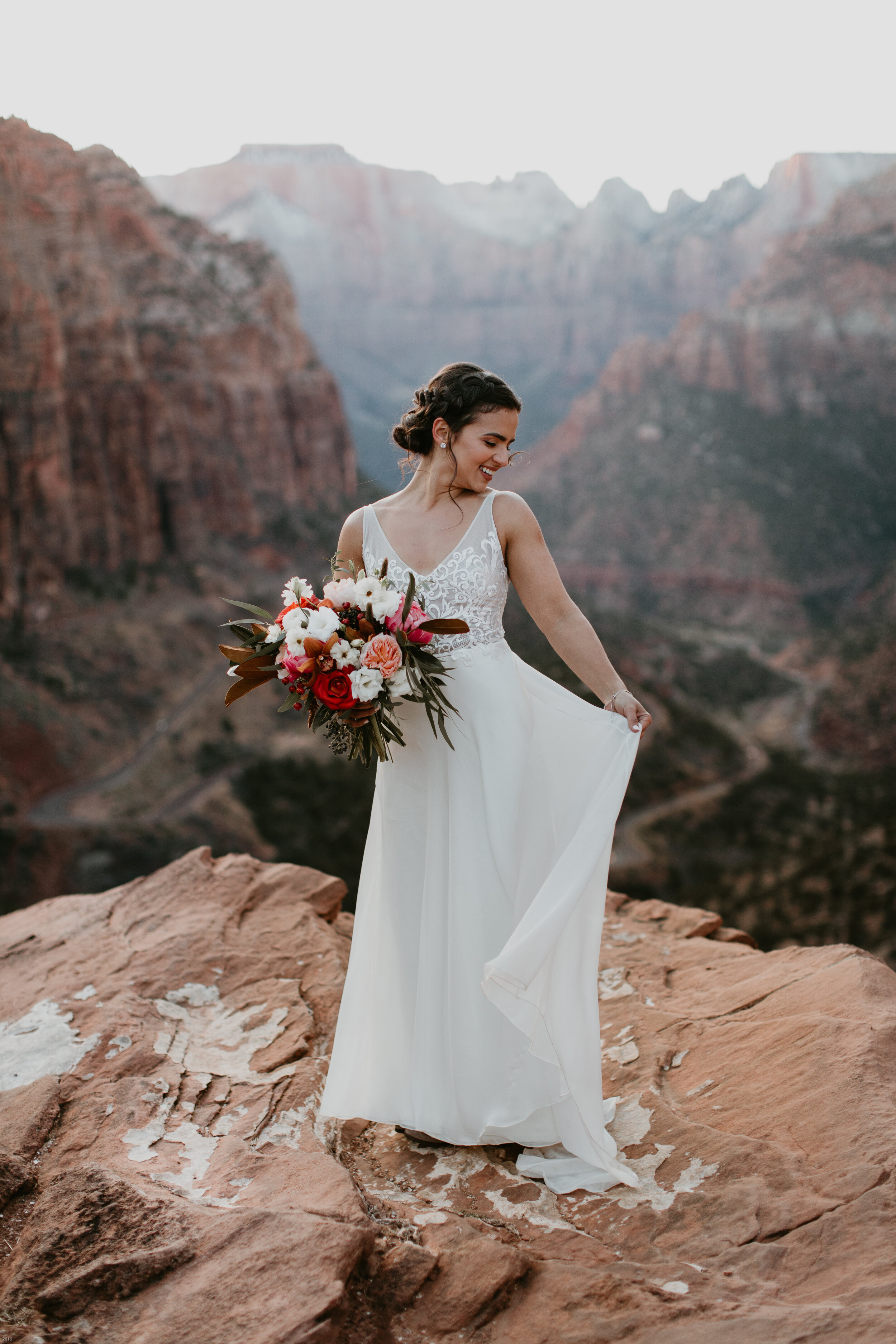 Nicole-Daacke-Photography-snowy-hiking-elopement-in-zion-national-park-zion-elopement-photographer-canyon-overlook-trial-brial-portraits-in-mt-zion-national-park-utah-desert-adventure-elopement-photographer-146.jpg