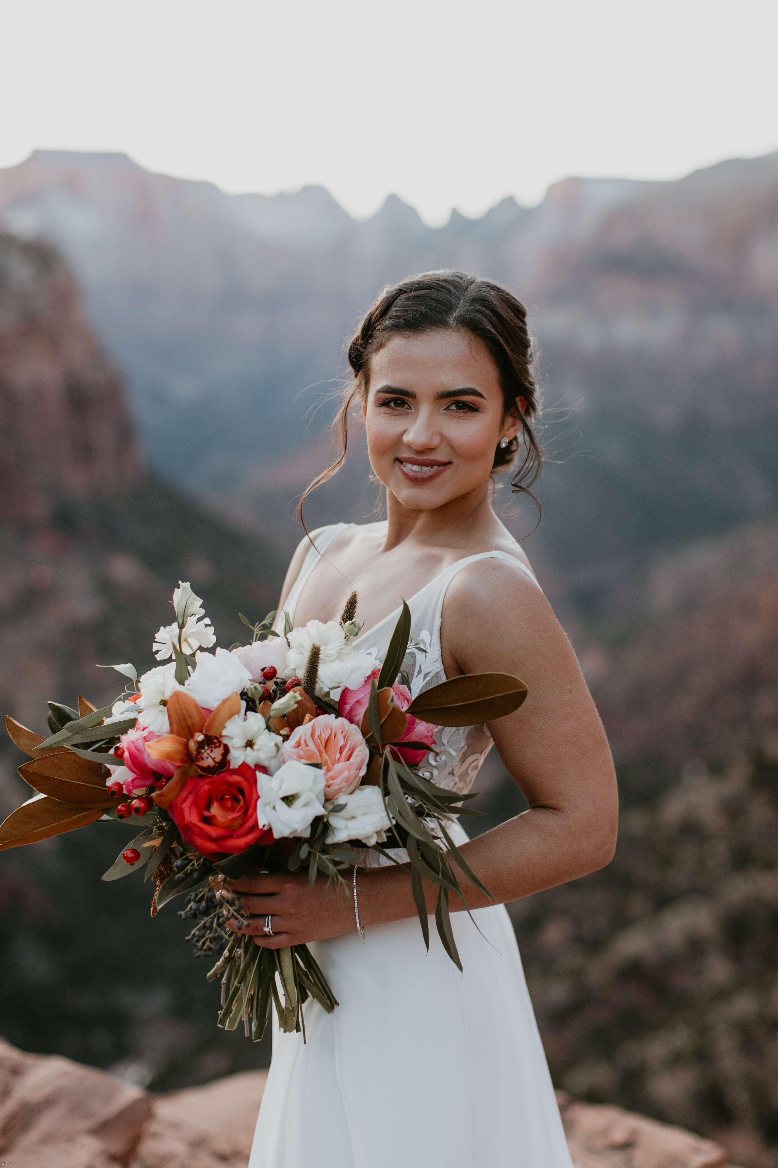 Nicole-Daacke-Photography-snowy-hiking-elopement-in-zion-national-park-zion-elopement-photographer-canyon-overlook-trial-brial-portraits-in-mt-zion-national-park-utah-desert-adventure-elopement-photographer-147.jpg