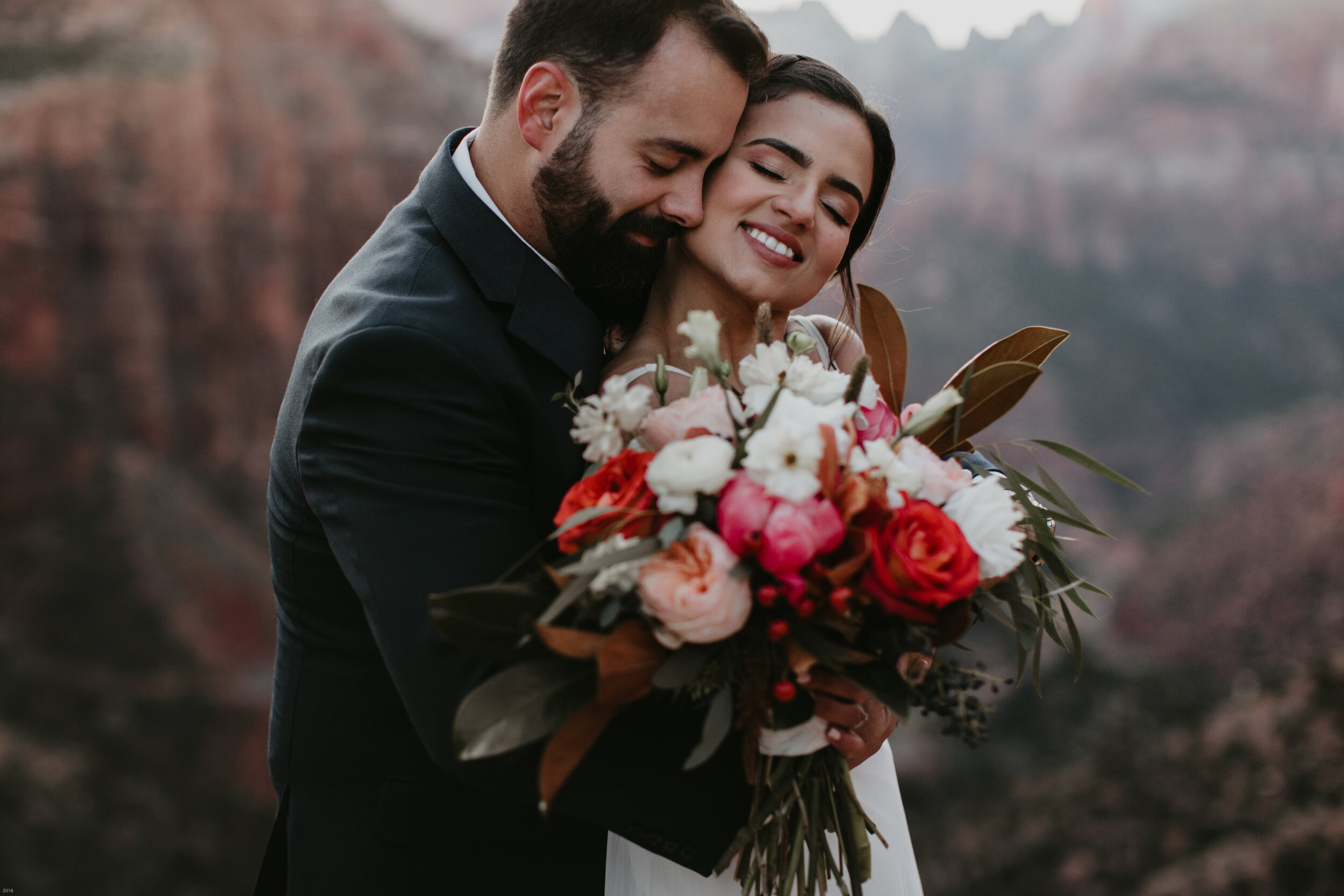 Nicole-Daacke-Photography-snowy-hiking-elopement-in-zion-national-park-zion-elopement-photographer-canyon-overlook-trial-brial-portraits-in-mt-zion-national-park-utah-desert-adventure-elopement-photographer-159.jpg