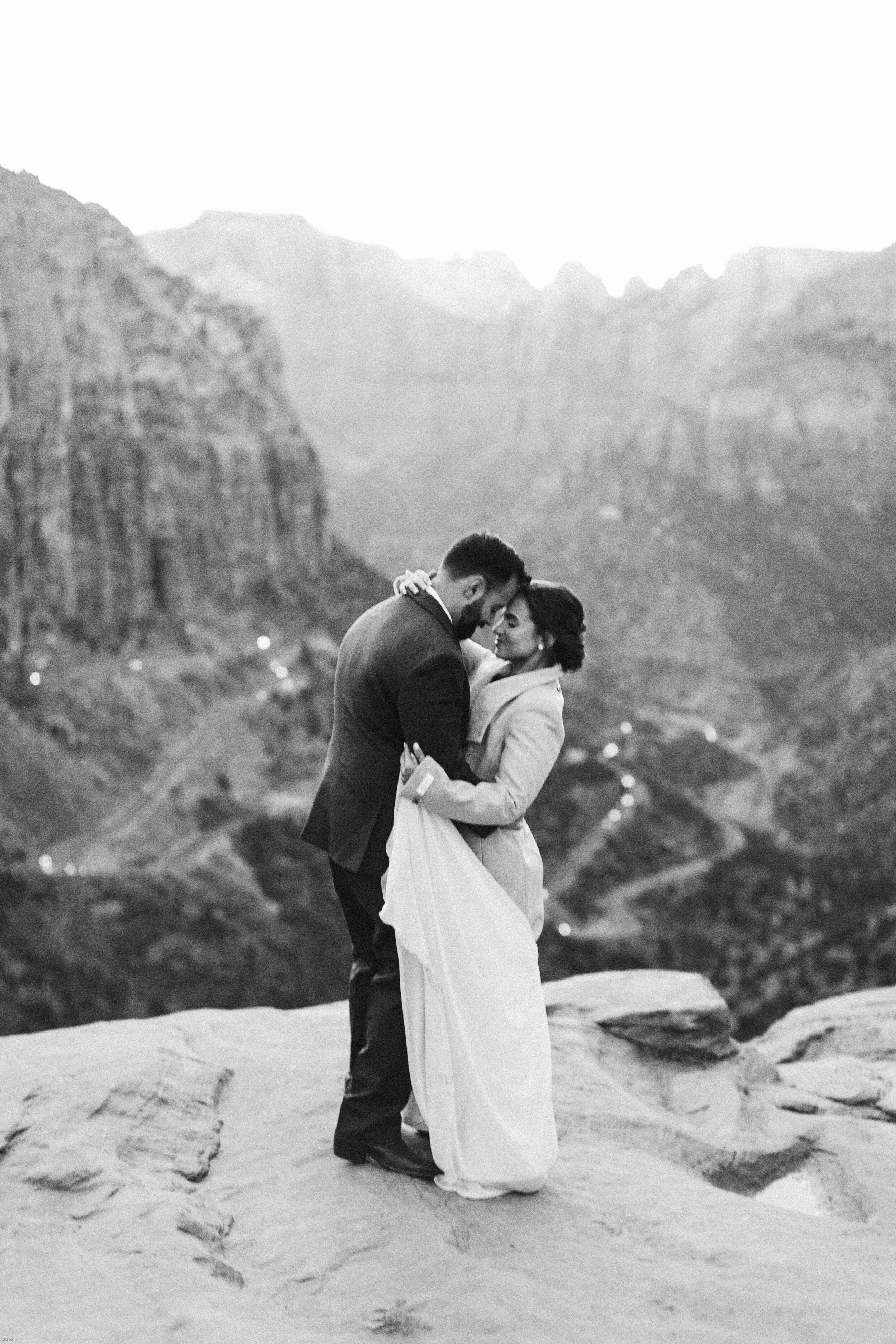 Nicole-Daacke-Photography-snowy-hiking-elopement-in-zion-national-park-zion-elopement-photographer-canyon-overlook-trial-brial-portraits-in-mt-zion-national-park-utah-desert-adventure-elopement-photographer-175.jpg