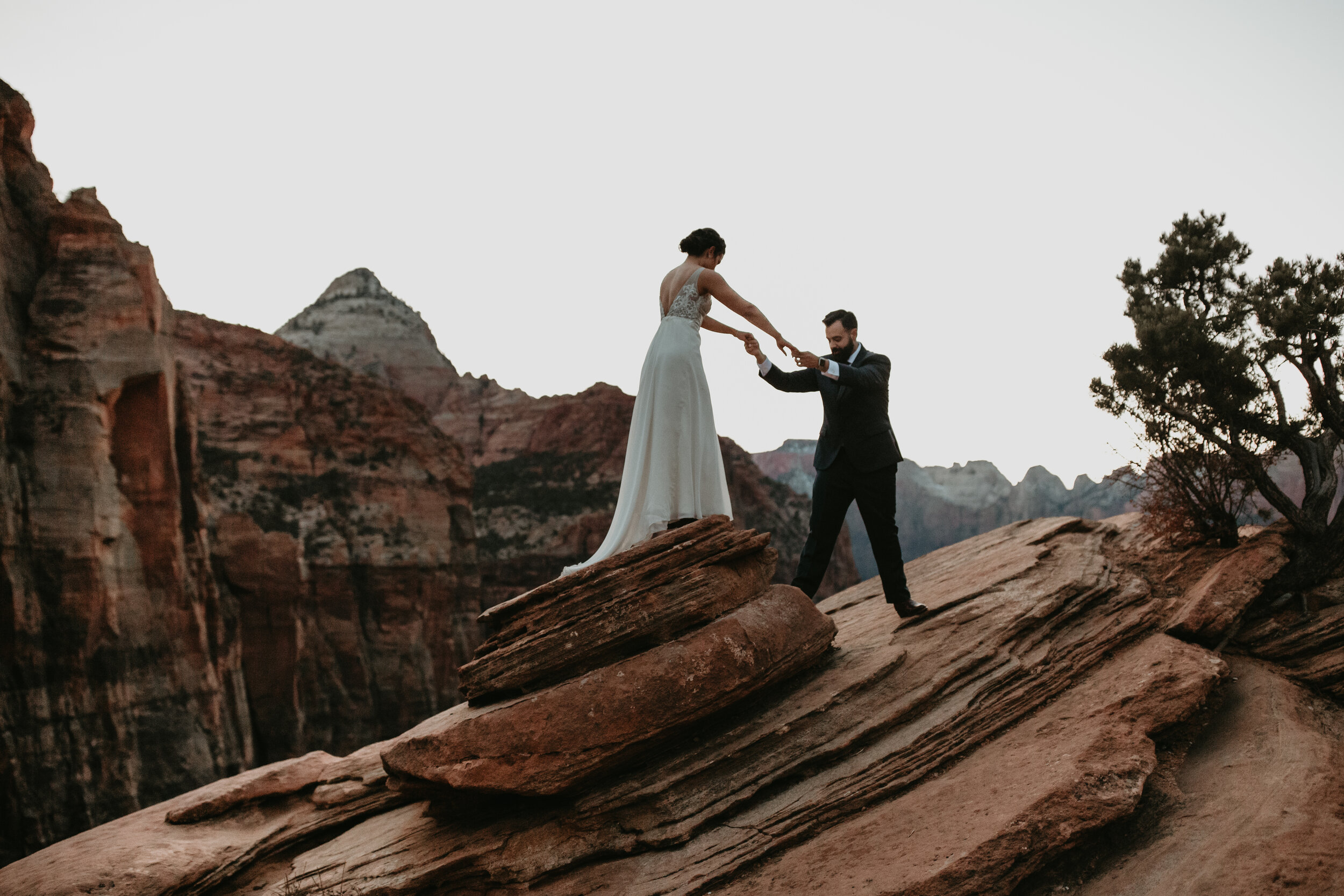 Nicole-Daacke-Photography-snowy-hiking-elopement-in-zion-national-park-zion-elopement-photographer-canyon-overlook-trial-brial-portraits-in-mt-zion-national-park-utah-desert-adventure-elopement-photographer-181.jpg