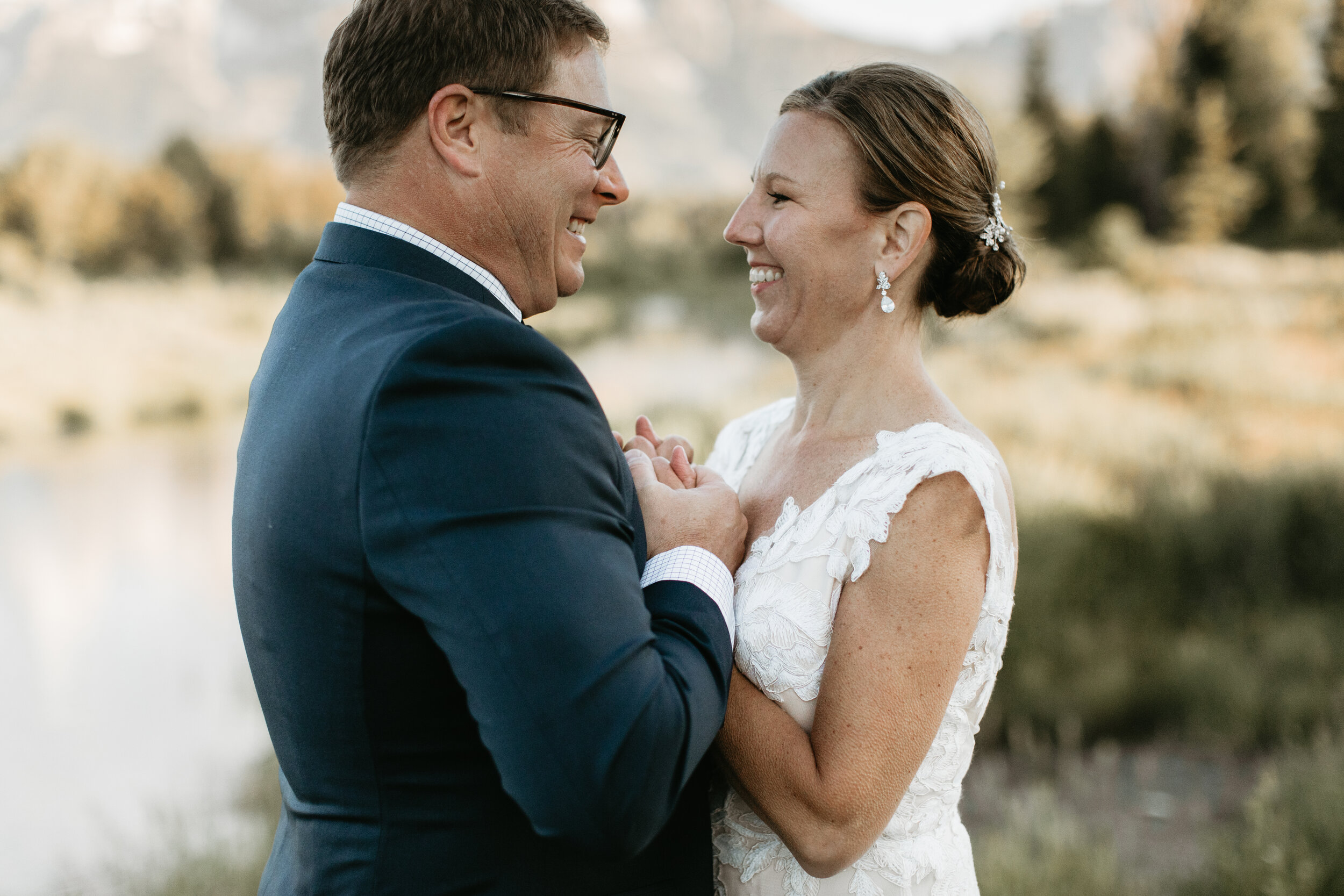 Nicole-Daacke-Photography-coupleholdinghands_grandtetons.jpg