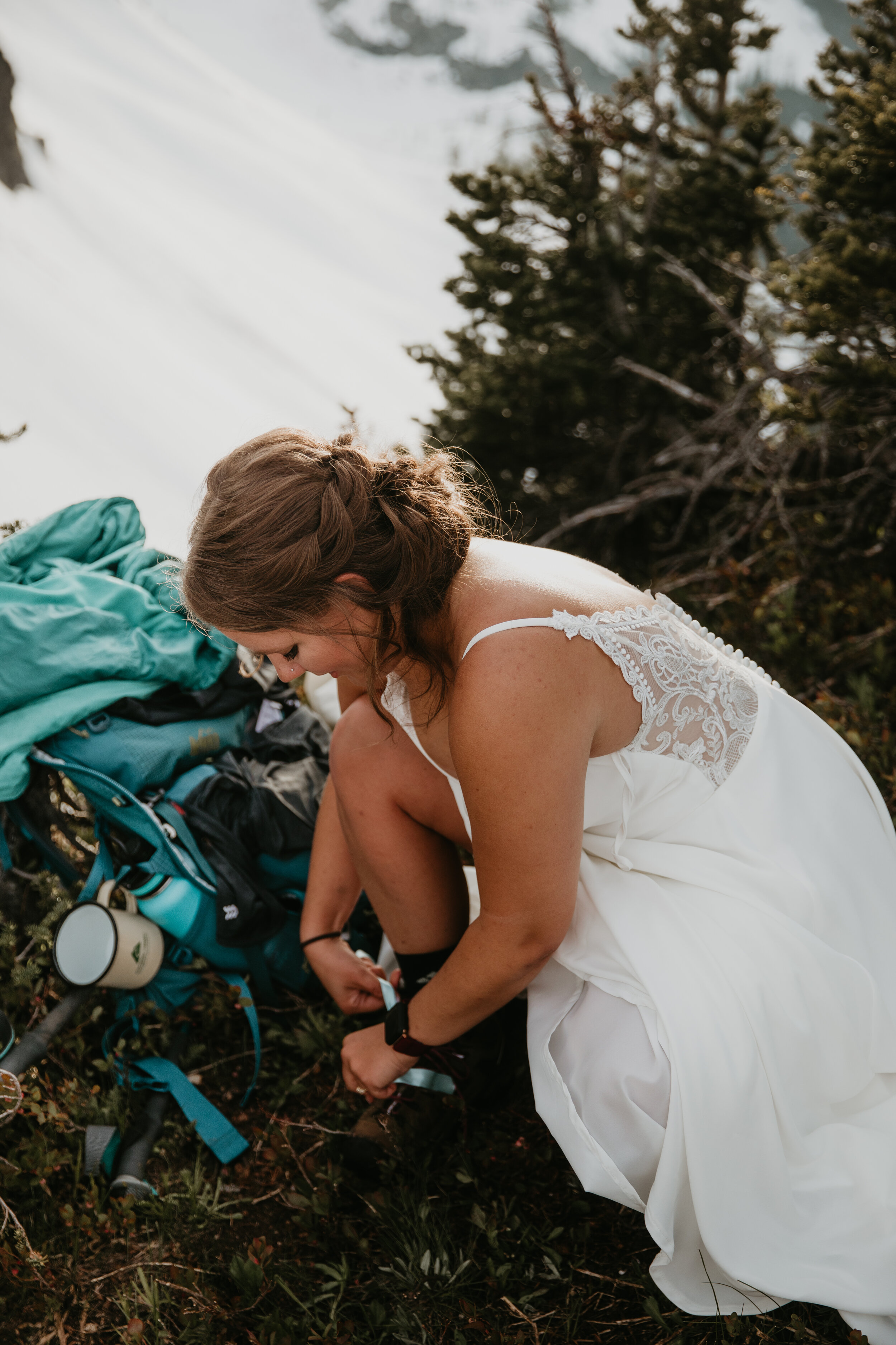 Nicole-Daacke-Photography-hiking-bride-wedding-dress.jpg