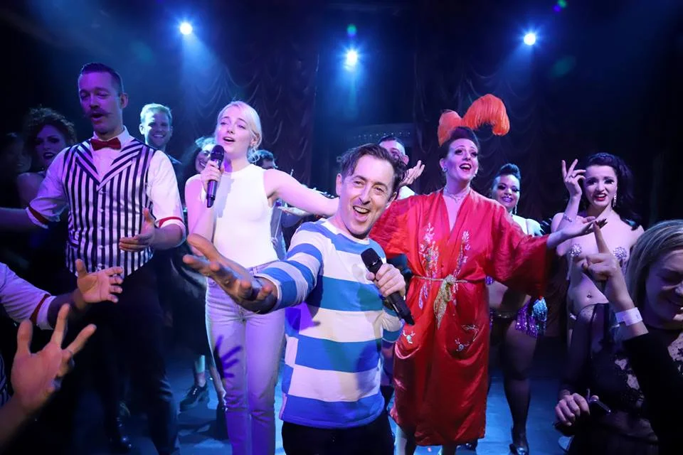 The Apple Boys on stage with Emma Stone and Alan Cumming at The Box