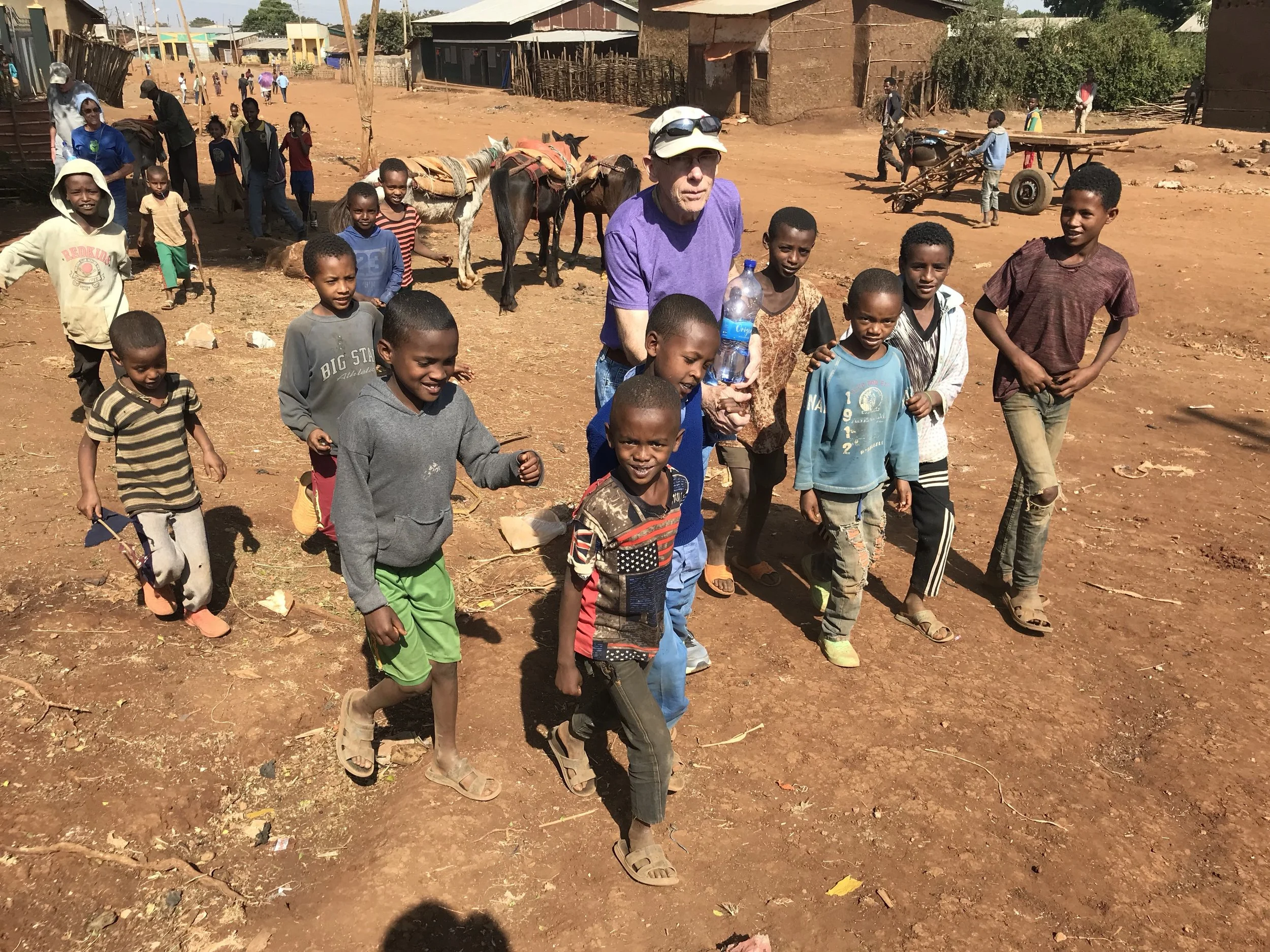 Every time we wandered through the village, we acquired an entourage of children eager to hold our hands and walk with us. It was one of the most memorable and endearing parts of our trip.
