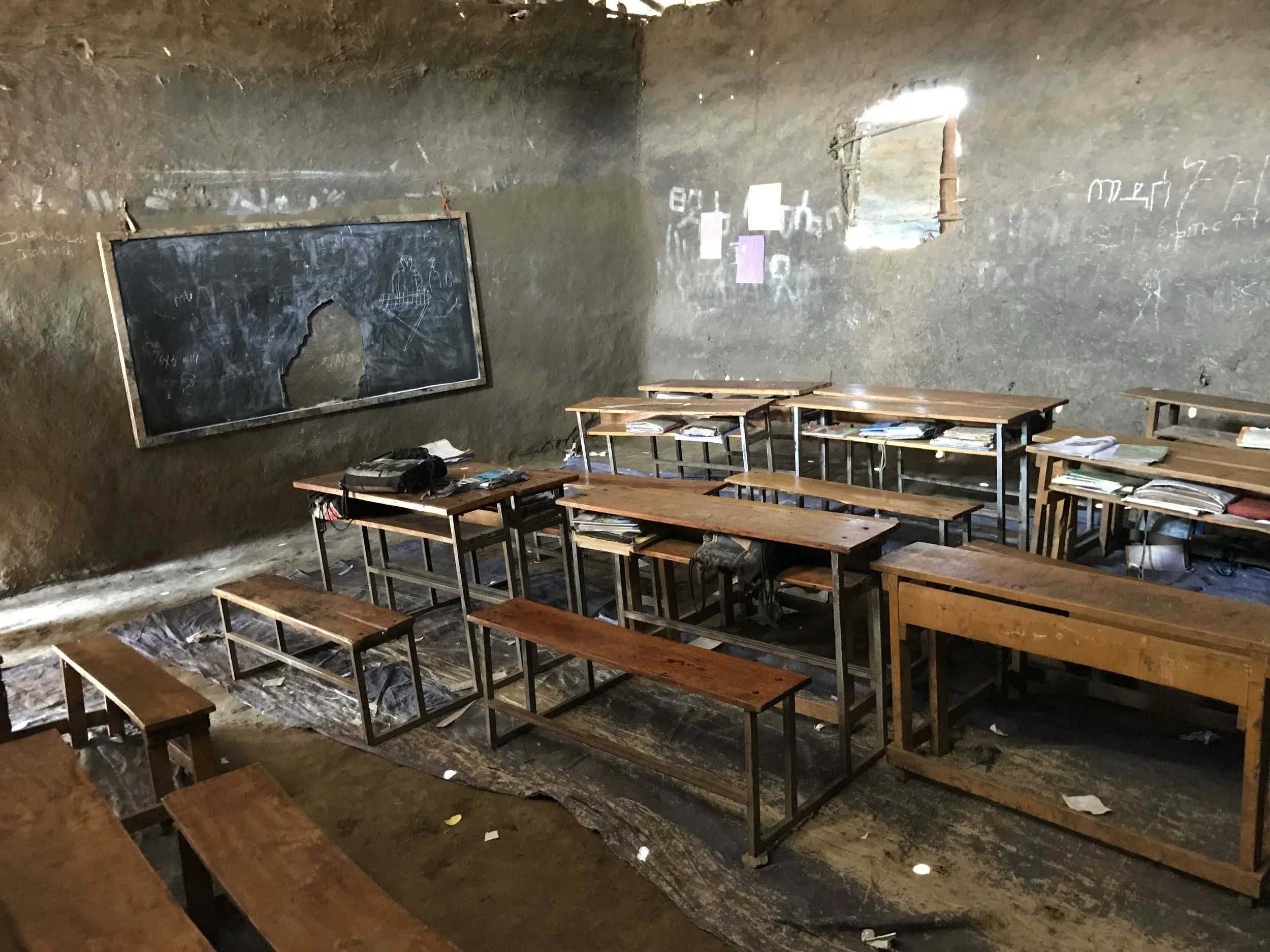 A classroom at the Fule school. In addition to providing concrete floors for nine rooms, Friends of Homacho will purchase new blackboards for each classroom.