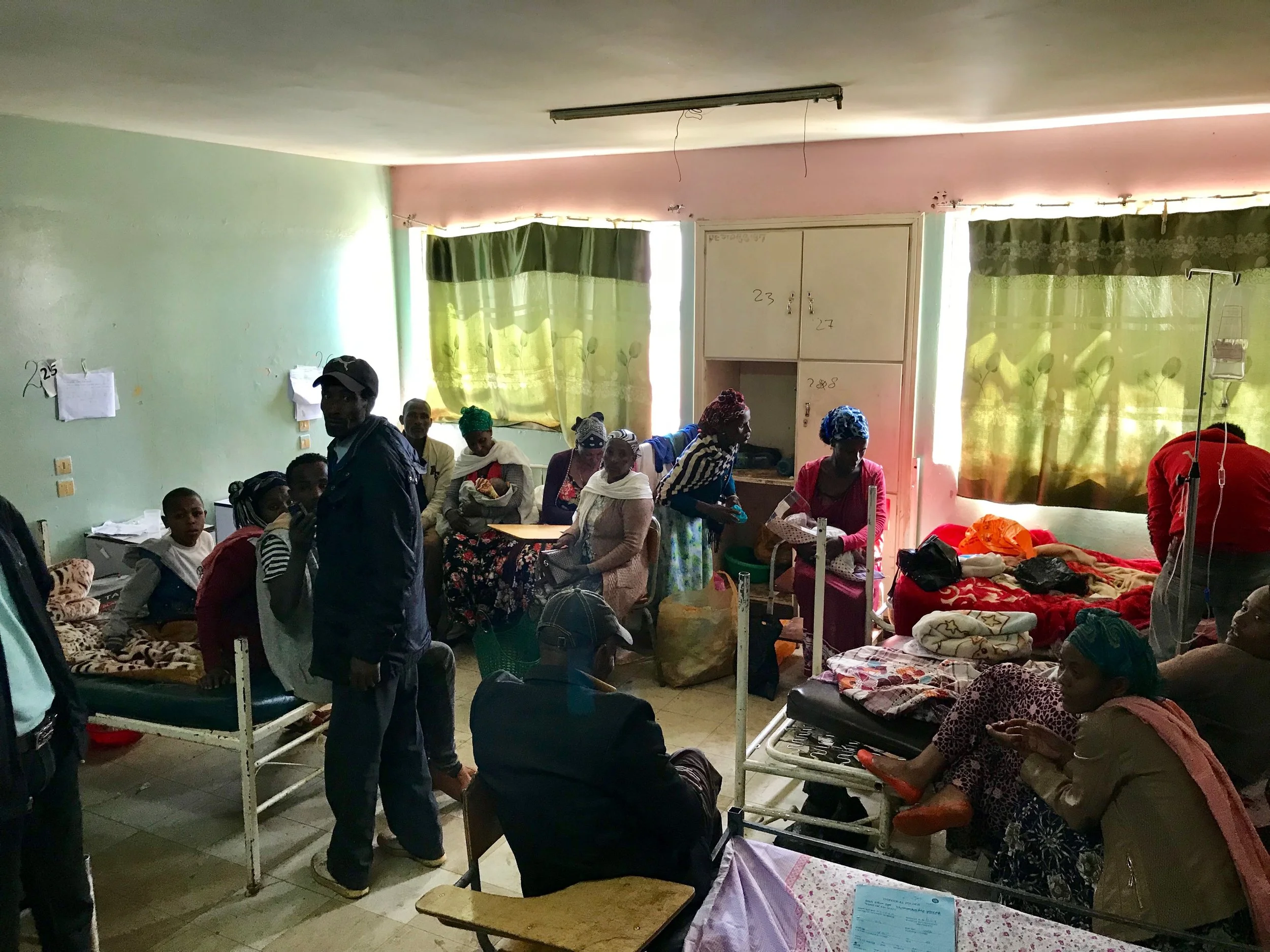 One of the busy pediatric wards. The young man in the bed to the left smiled at us and was well enough to get out of bed and follow us for a bit.