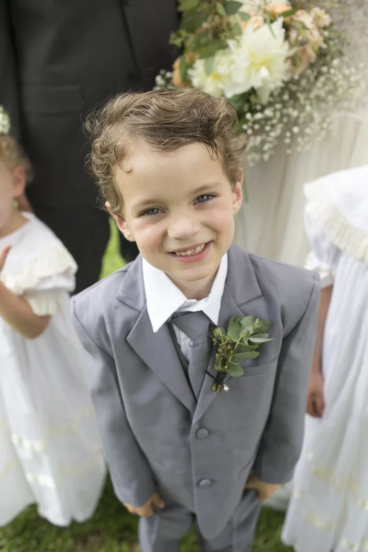 green boutonniere for ring bearer.jpg