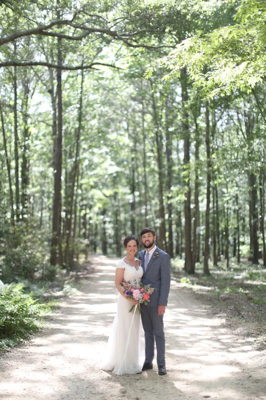 bride and groom on a dirt road.jpg