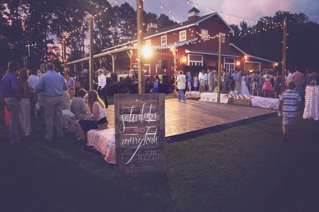 outdoor reception with red barn.jpg