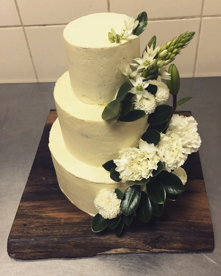 Wedding Cake with local flowers; Rancho Santana, Nicaragua