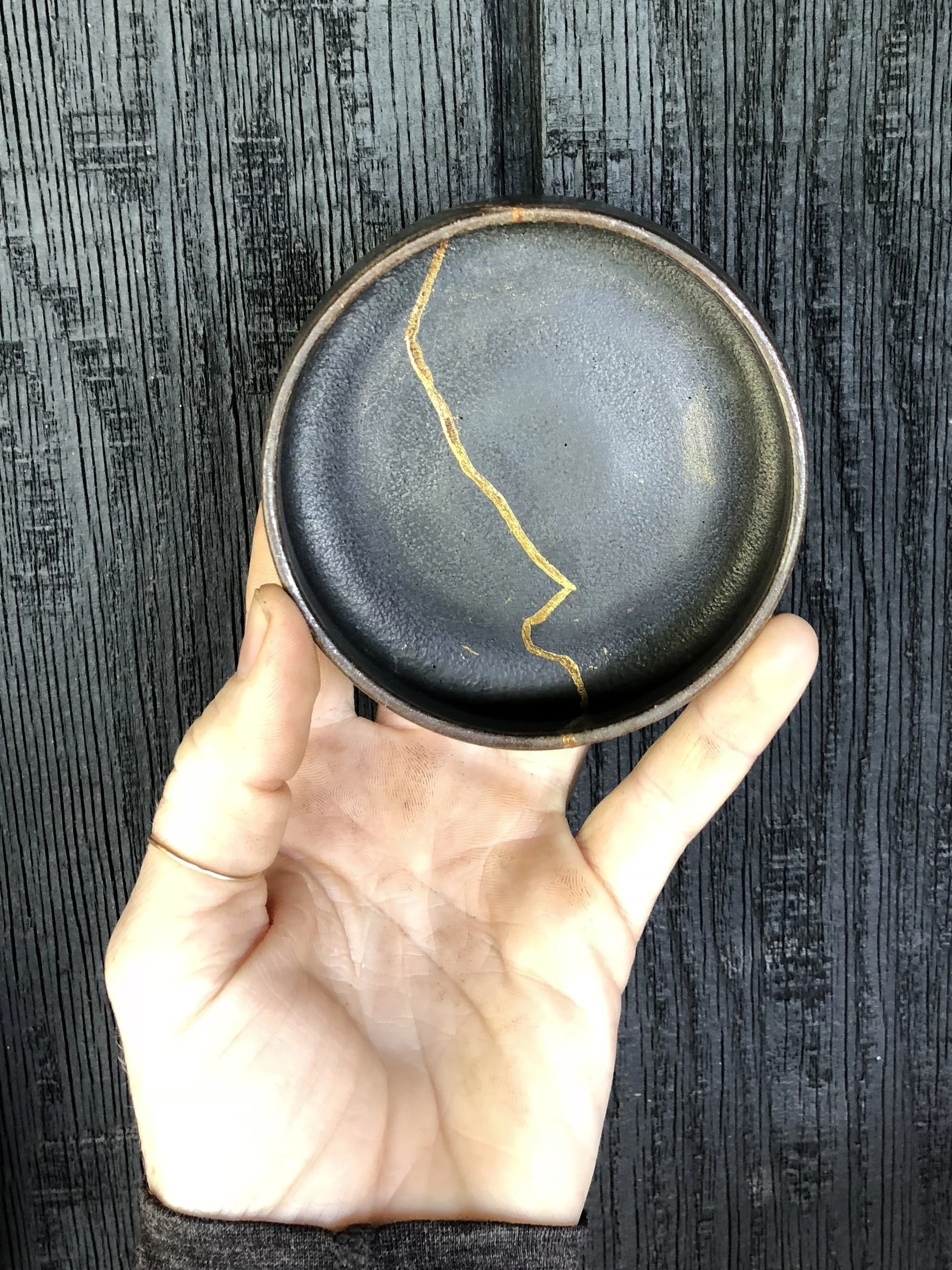 Kintsugi repair of Kelli Cain pottery