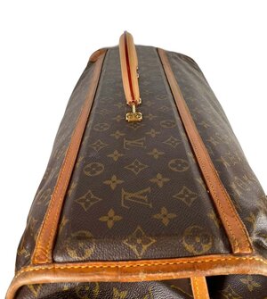 Lot - THREE PIECES OF REPRODUCTION LOUIS VUITTON LUGGAGE 20th Century  Largest height 19”. Length 26”. Depth 8.5”.