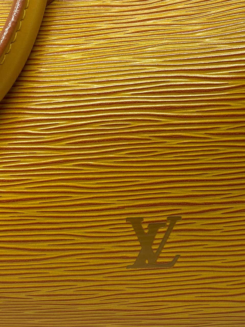 louis vuitton yellow logo