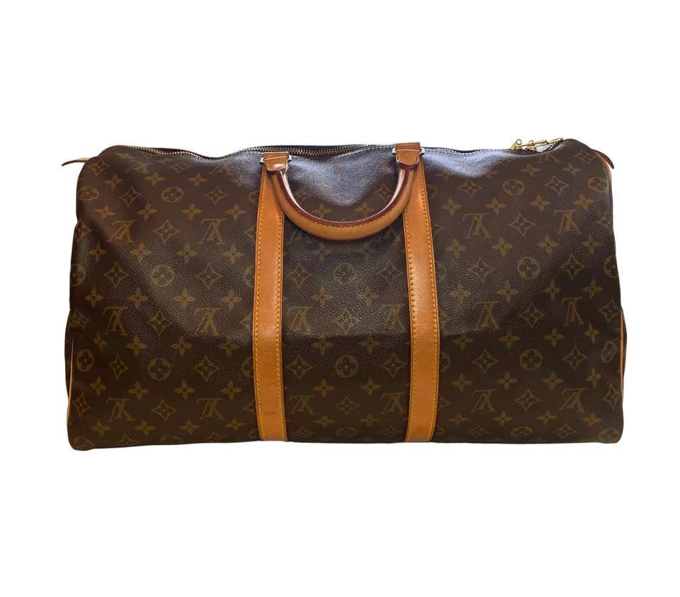 LOUIS VUITTON Brown Monogram Coated Canvas and Vachetta Leather Vintage  Keepall 55