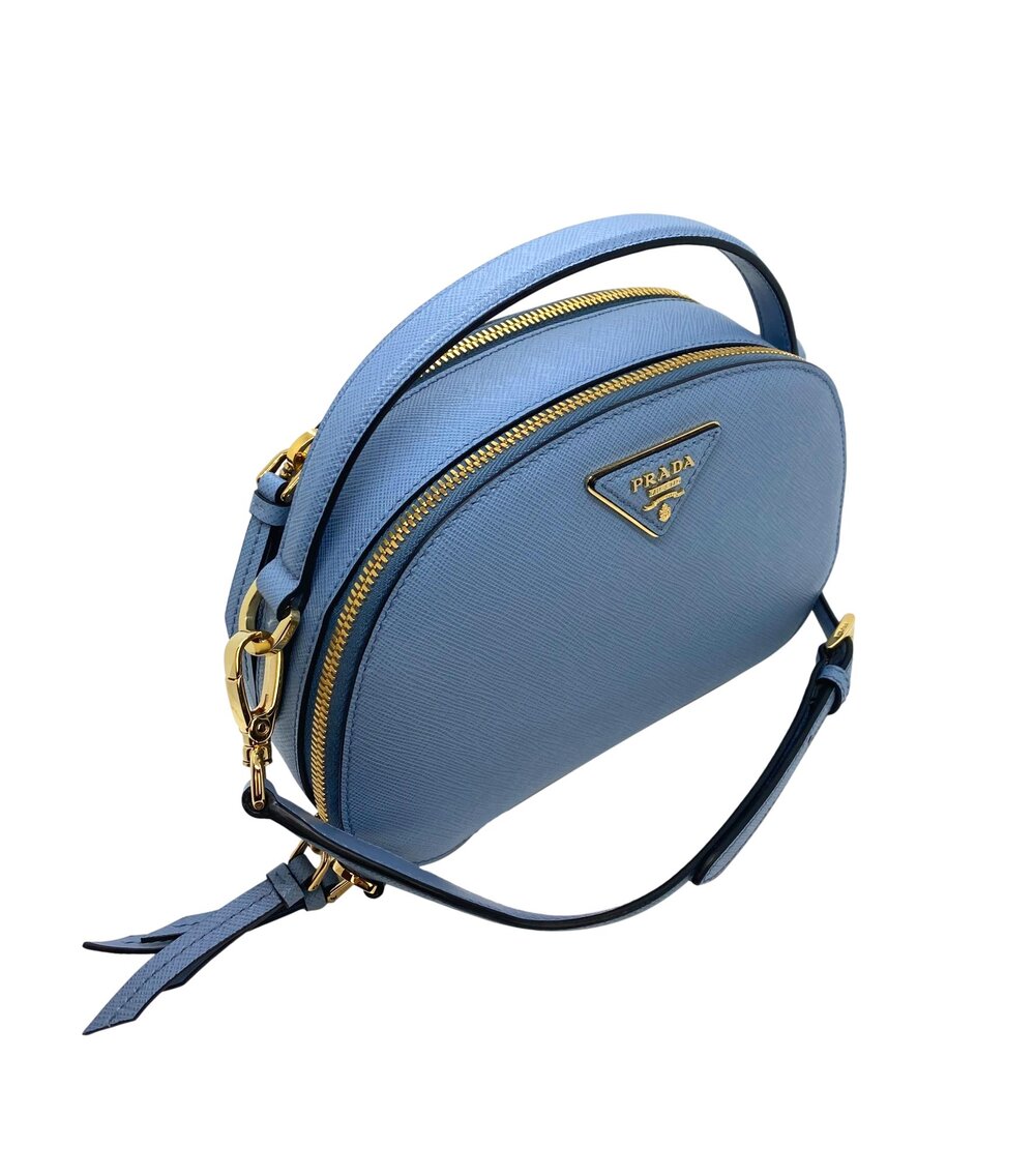 Prada Odette Mini Backpack In Saffiano Leather With Triangular