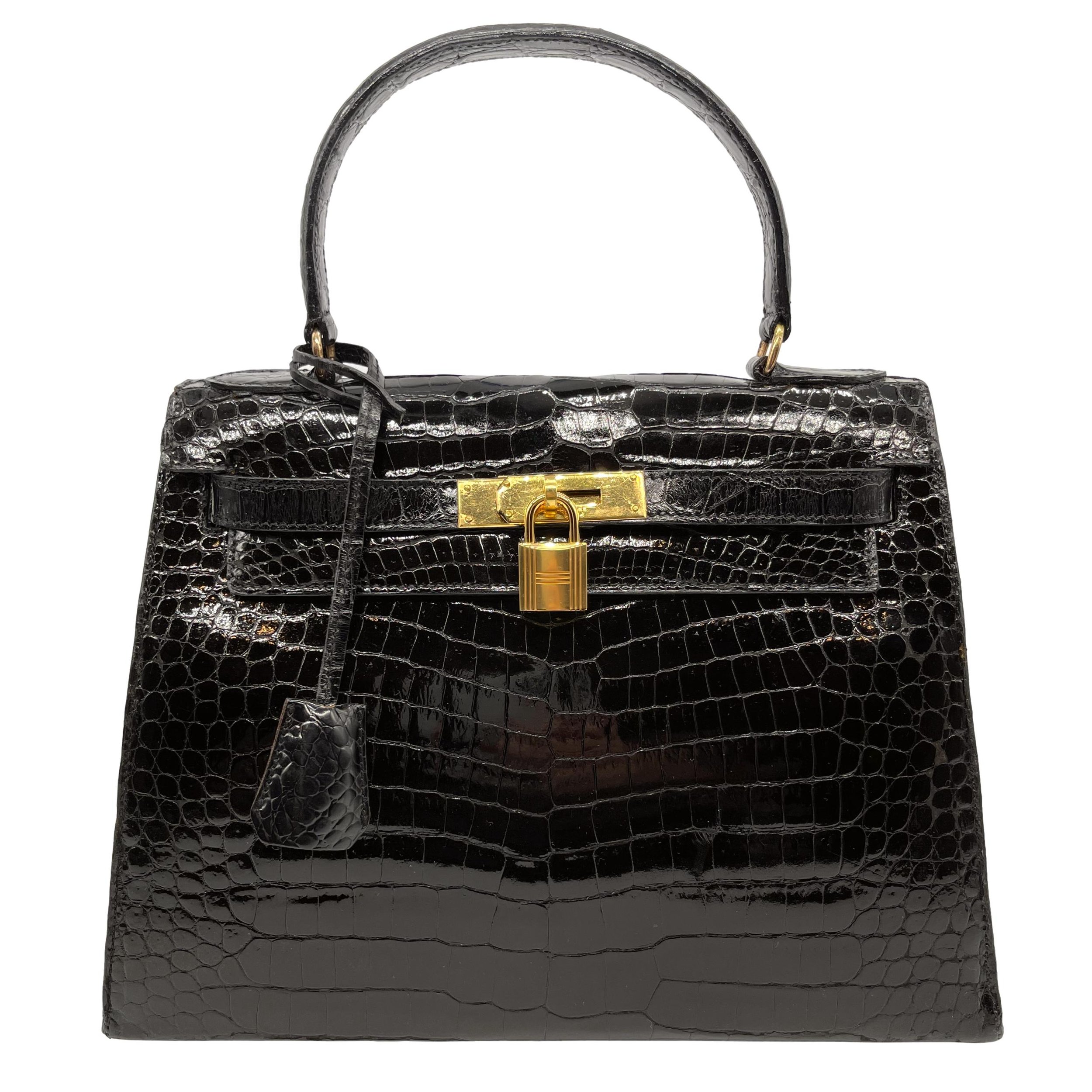 Hermès Vintage Shiny Black Porosus Crocodile Bag with Gold Hardware 28, 1940.