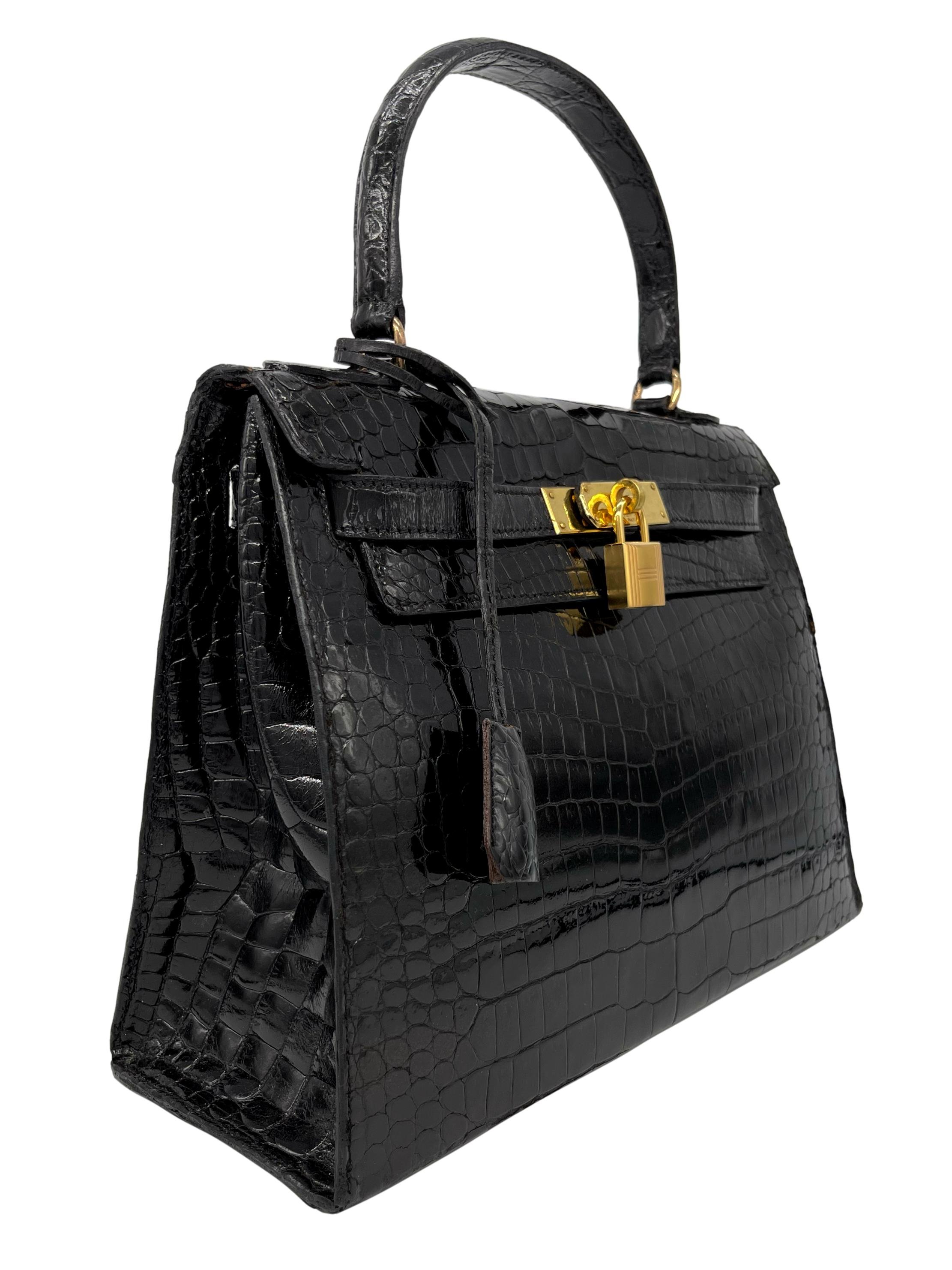 Hermès Vintage Shiny Black Porosus Crocodile Bag with Gold Hardware 28, 1940.