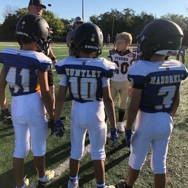 Week 5: MM Football and MM Cheer

It's a Trojans MM win and shutout! Last weekend, our MM players and cheerleaders WON BIG against the Dripping Springs Tigers, 28 to 0! We are super proud of how hard these players played and how spirited these cheerl
