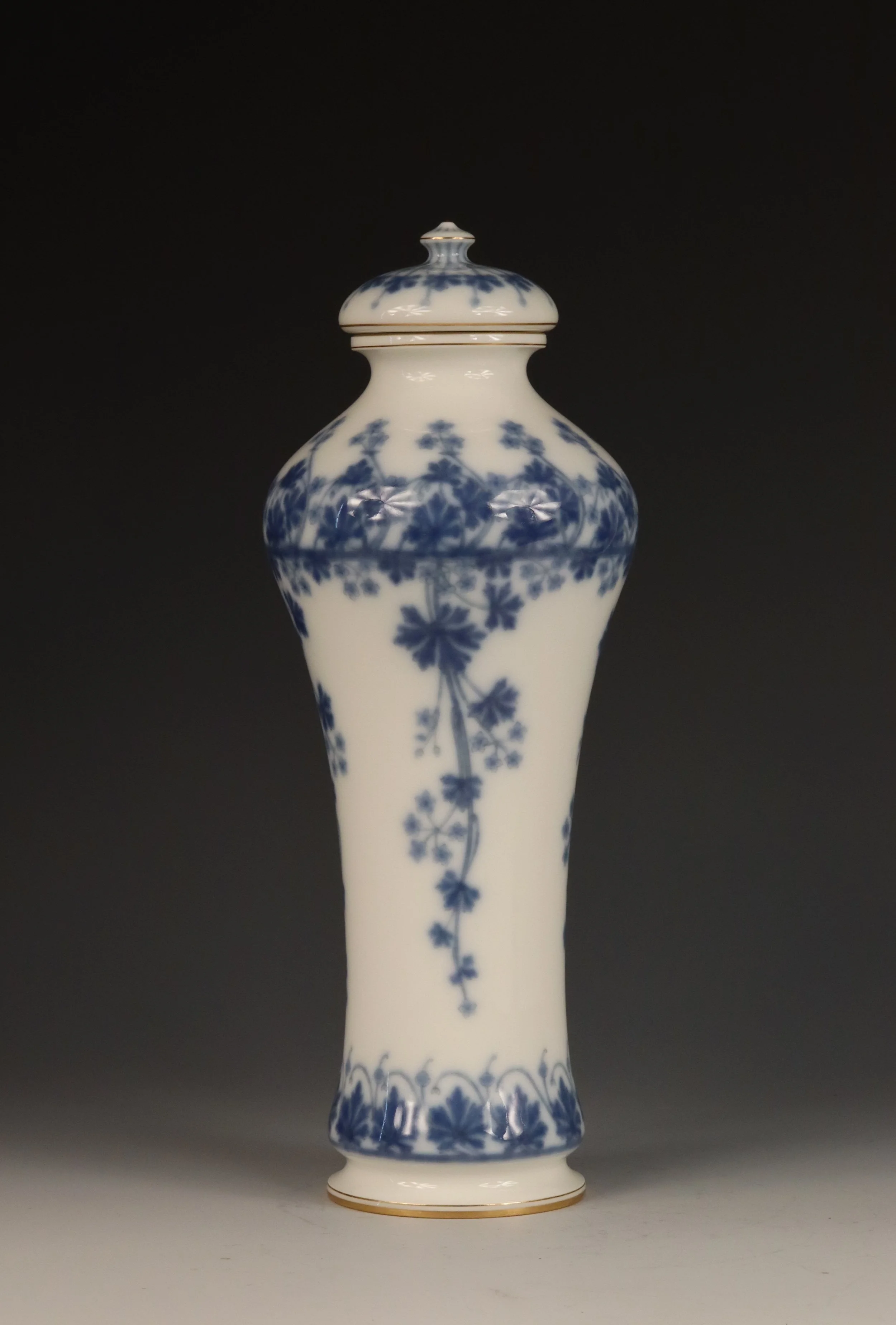Sèvres art nouveau covered vase with all round decoration of blue vine flowers, 1898