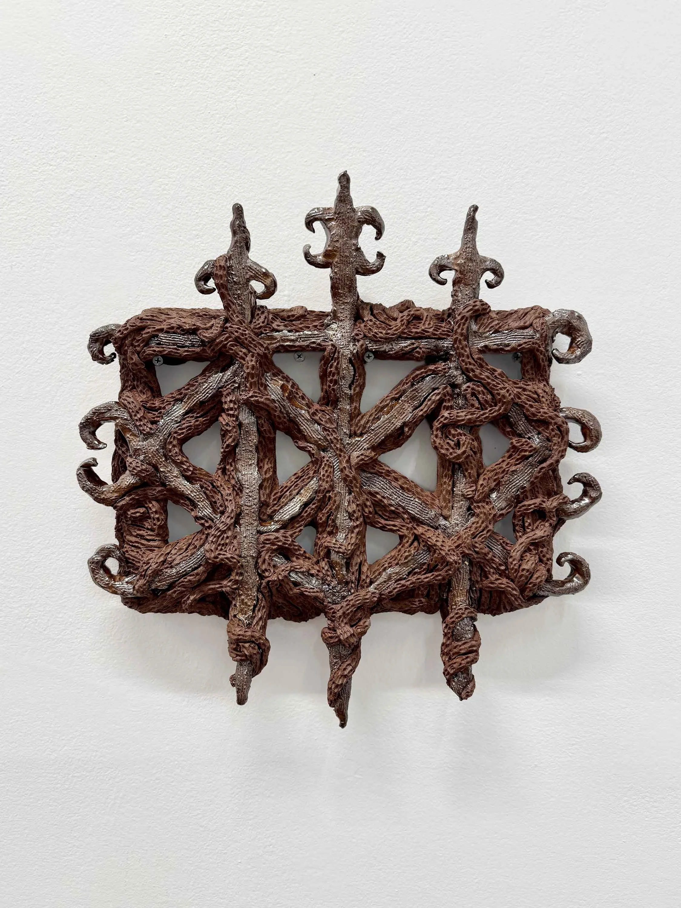   If You Breathe, It Breaks   2026  ceramic, glaze  17” x 17.5” x 2.25” 