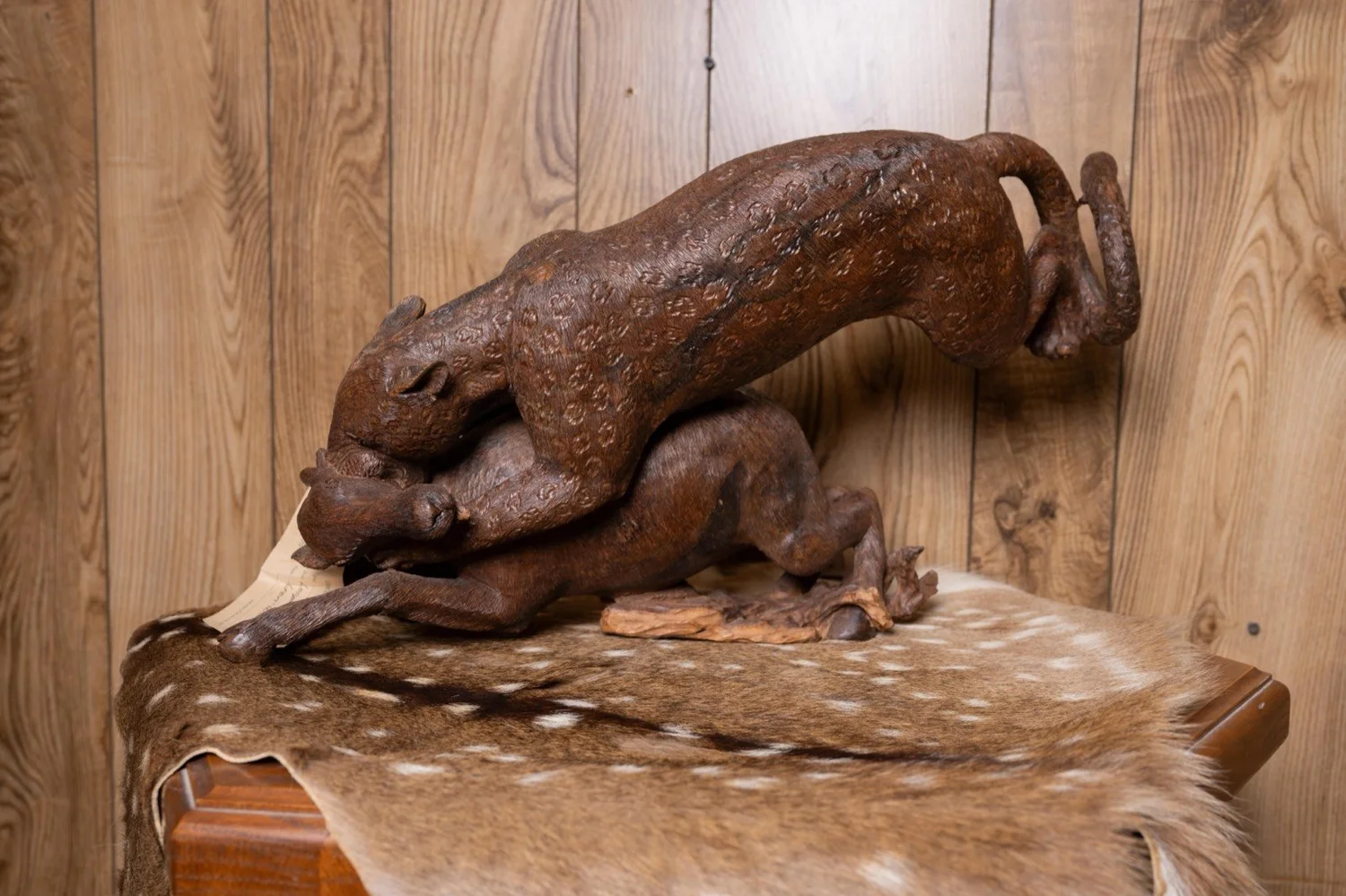 Leopard attacking impala carved in ironwood, South Africa, view 4