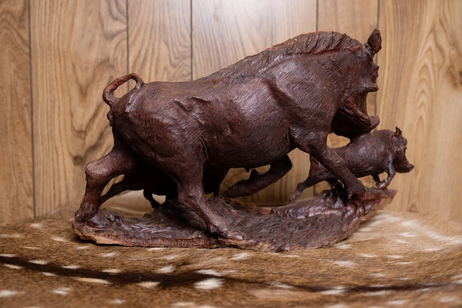 Warthog family carved in ironwood, South Africa, view 4