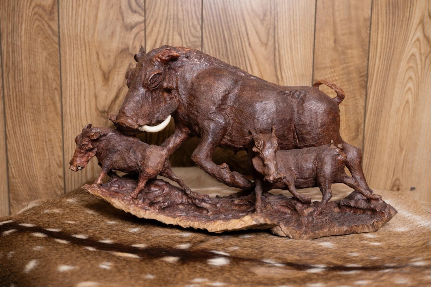 Warthog family carved in ironwood, South Africa, view 5