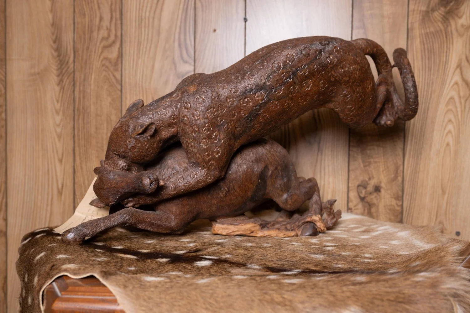 Leopard attacking impala carved in ironwood, South Africa, view 5