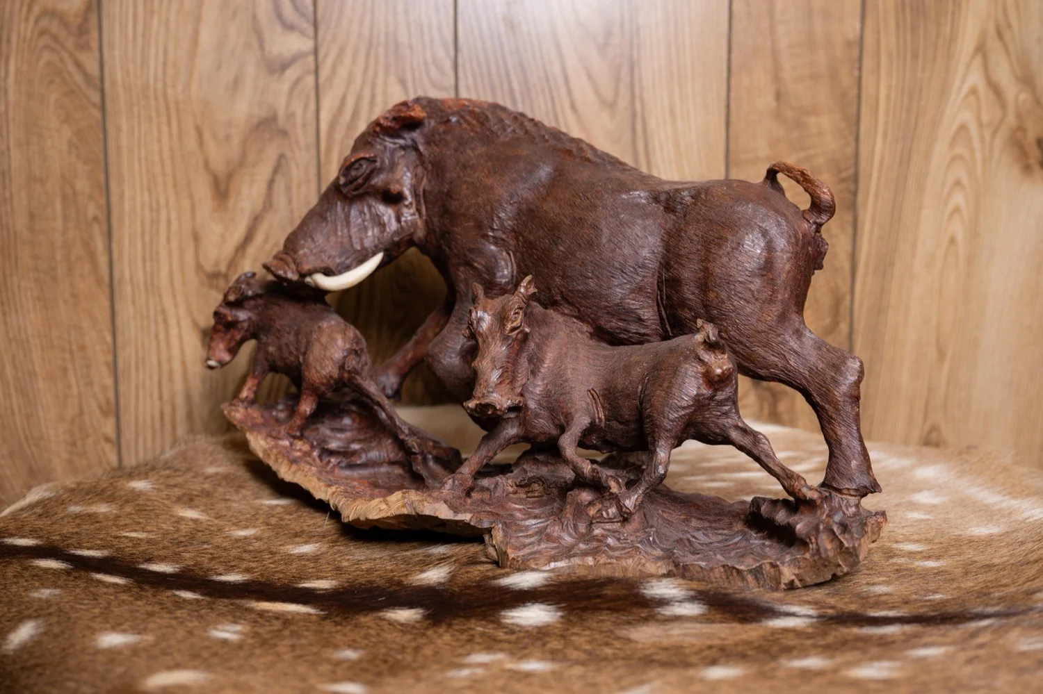 Warthog family carved in ironwood, South Africa, view 3