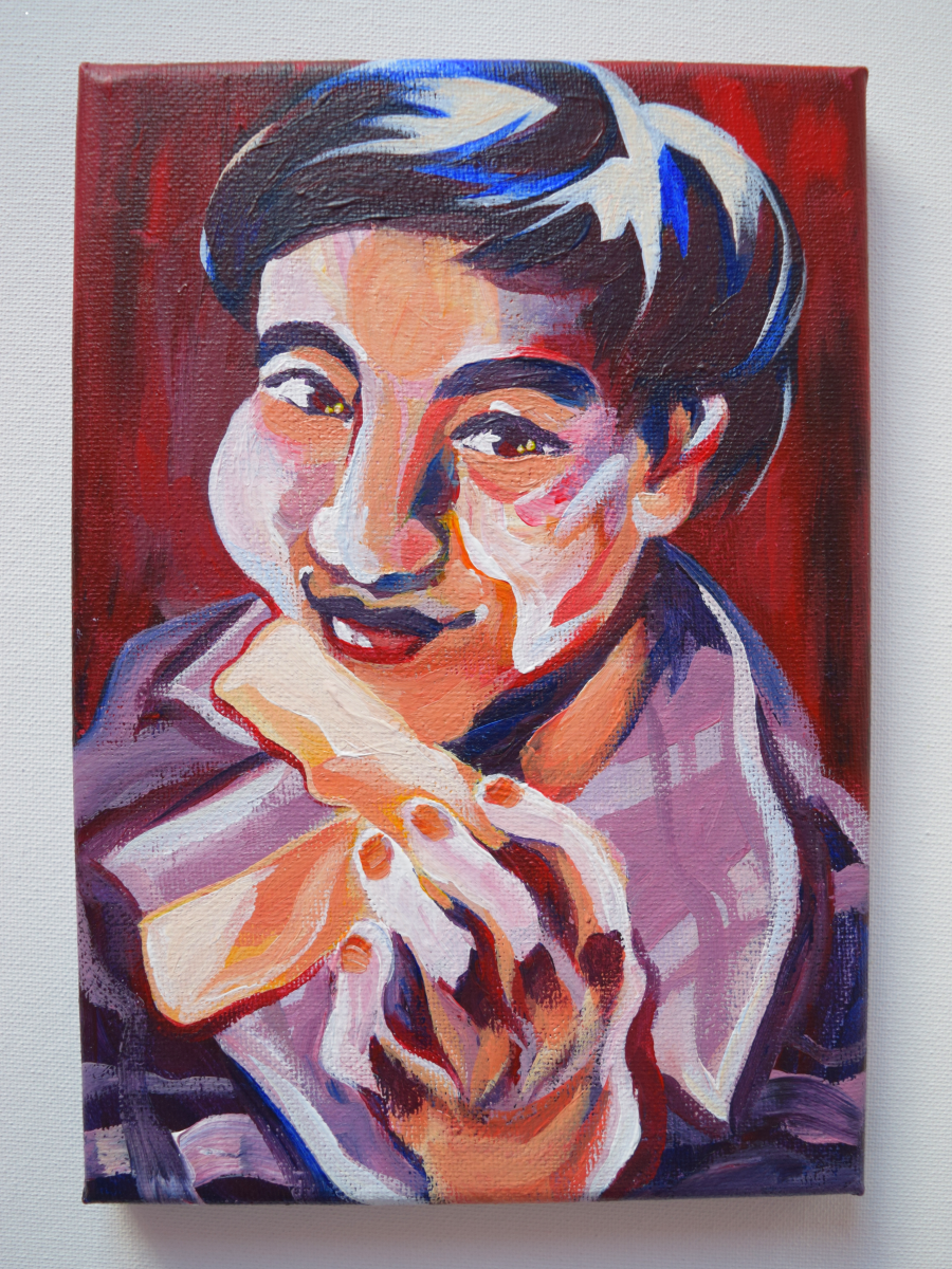 Painting of friend and fellow senior Angelique Nguyen with two egg rolls in hand