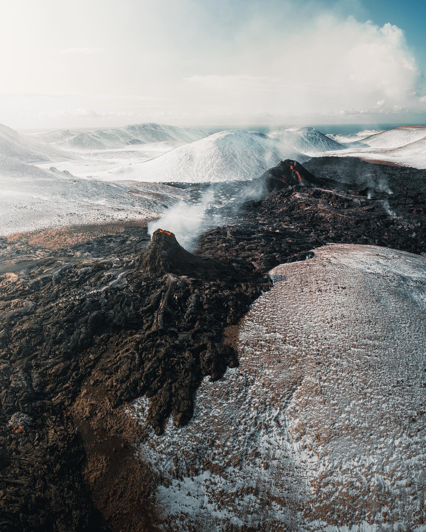 The show goes on. It's hard to keep up with the new fissures opening up but going there again tonight to see how it looks at the moment. Stay tuned! Here's an ice cold sunrise view in the meantime 🌋 swipe for the pano.

Follow @thrainnko for more ad