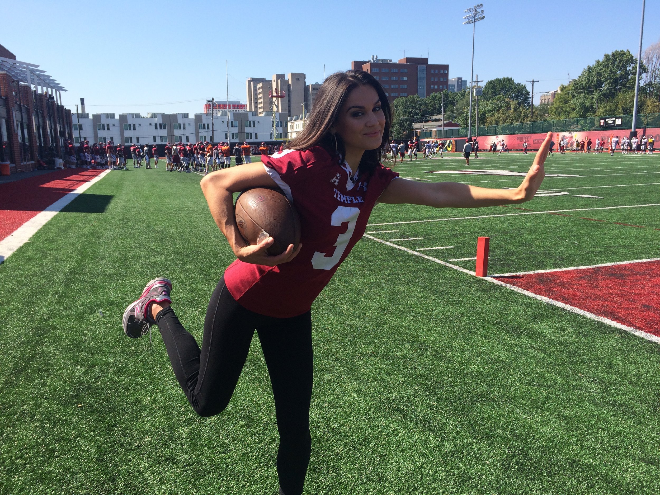 Nicole Brewer strikes her best Heisman pose, in honor of Temple's football team!