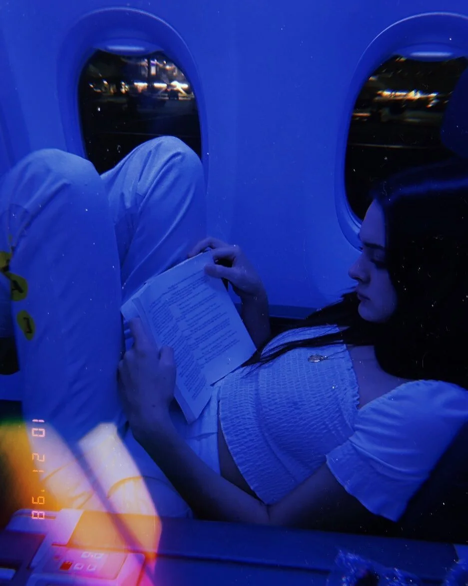 Love of my life @charlotteslawrence reading the first draft of my book on our flight to San Francisco almost exactly two years ago today. #peopleyoufollow is officially out in the US tomorrow and I am so grateful to her and all the people who have supported me through this strange and overwhelming process.