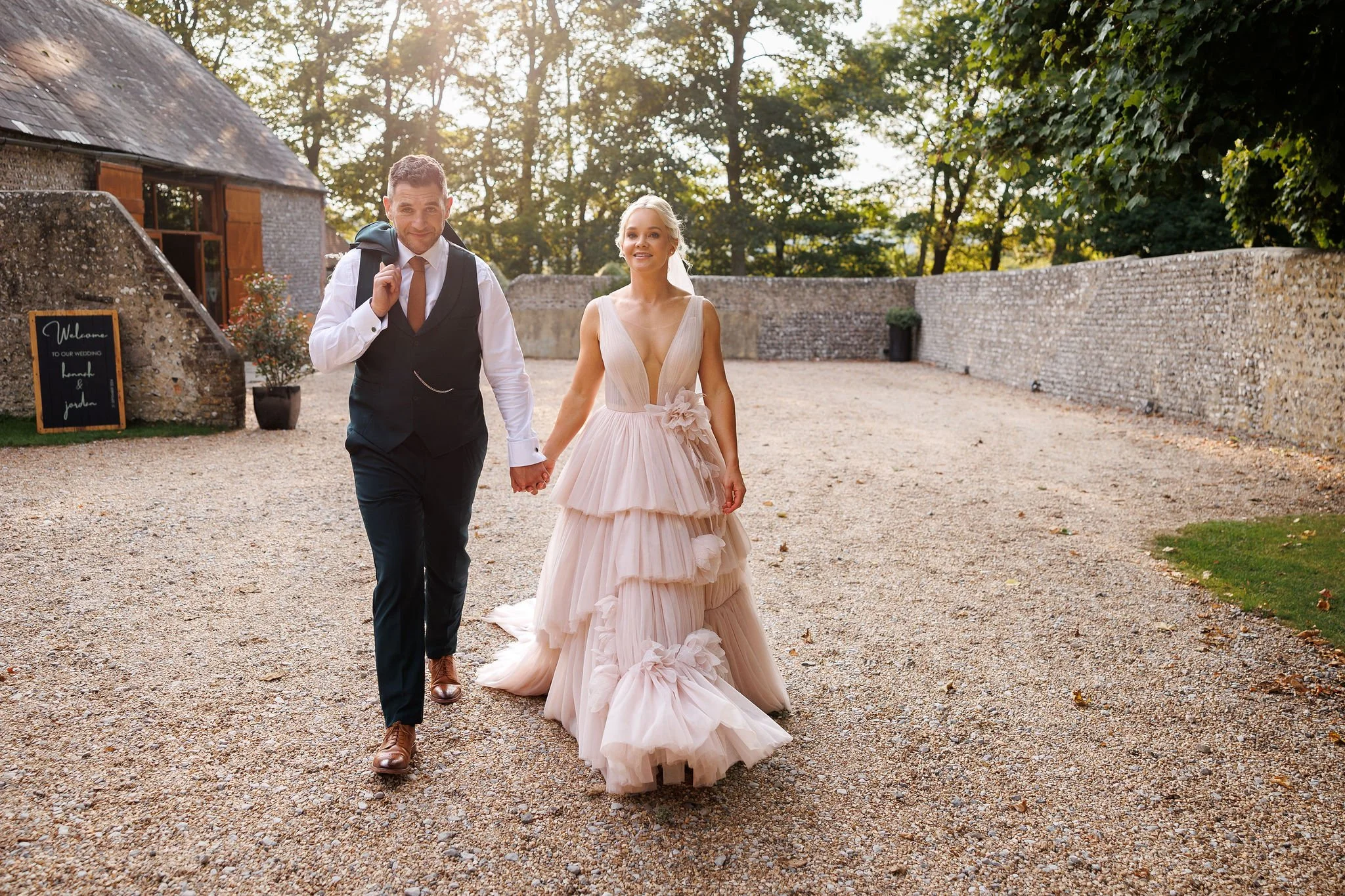 Pink wedding dress by Bride by Aster at Cissbury Barns in West Sussex
