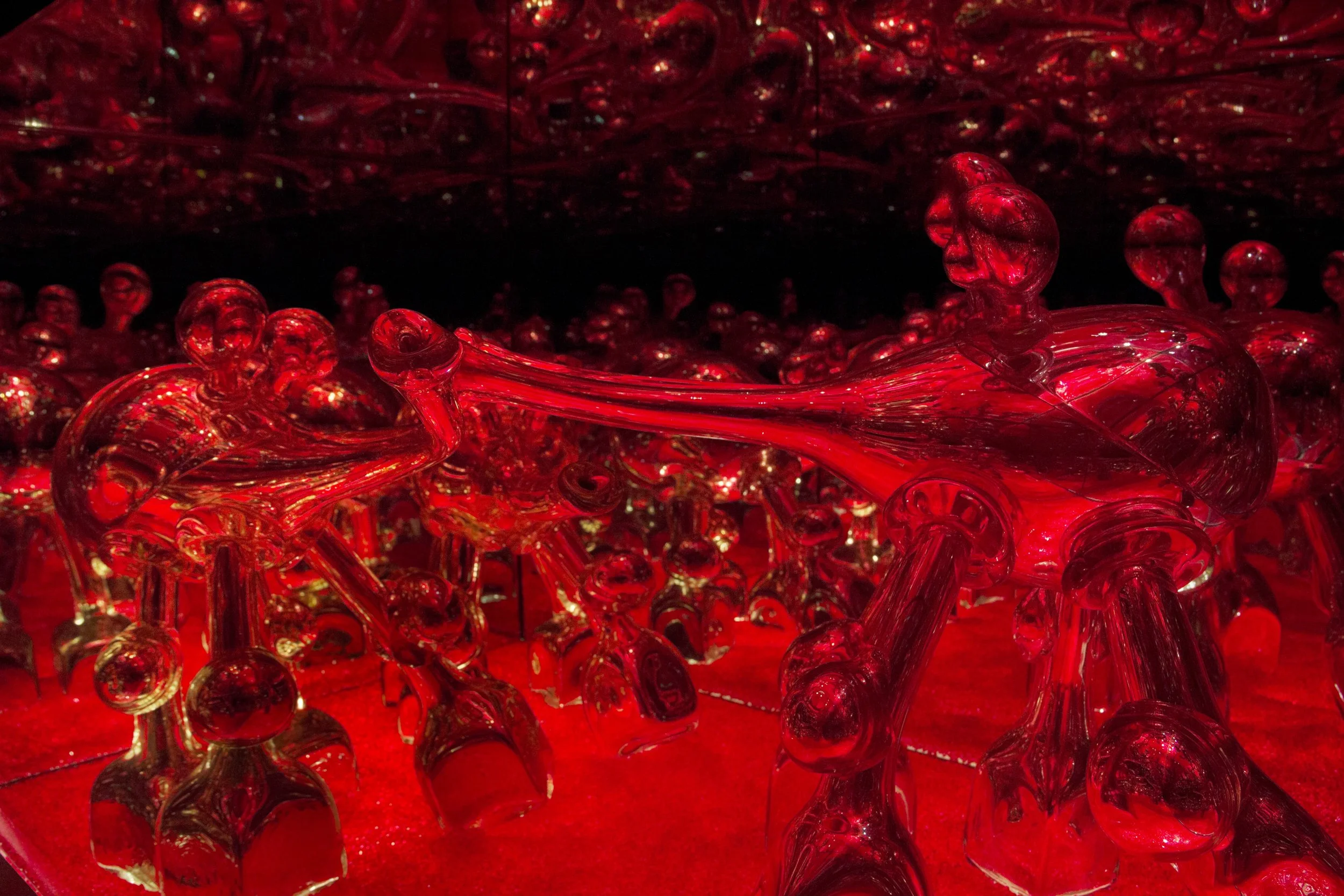 Cheerfully Rooting Through Ruby Red Detritus