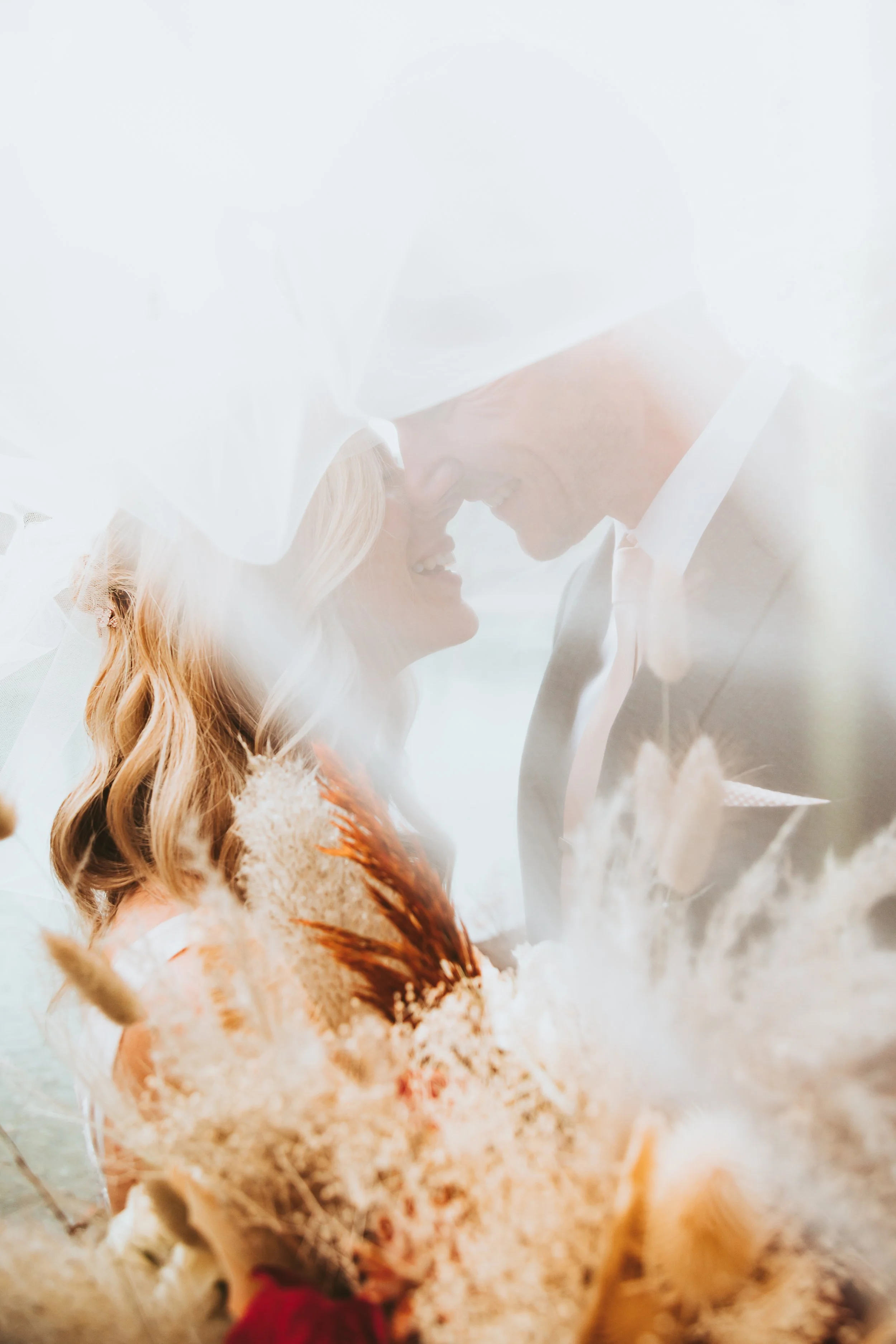 Couple sharing a quiet moment during a private Banff elopement in the rocky mountains.