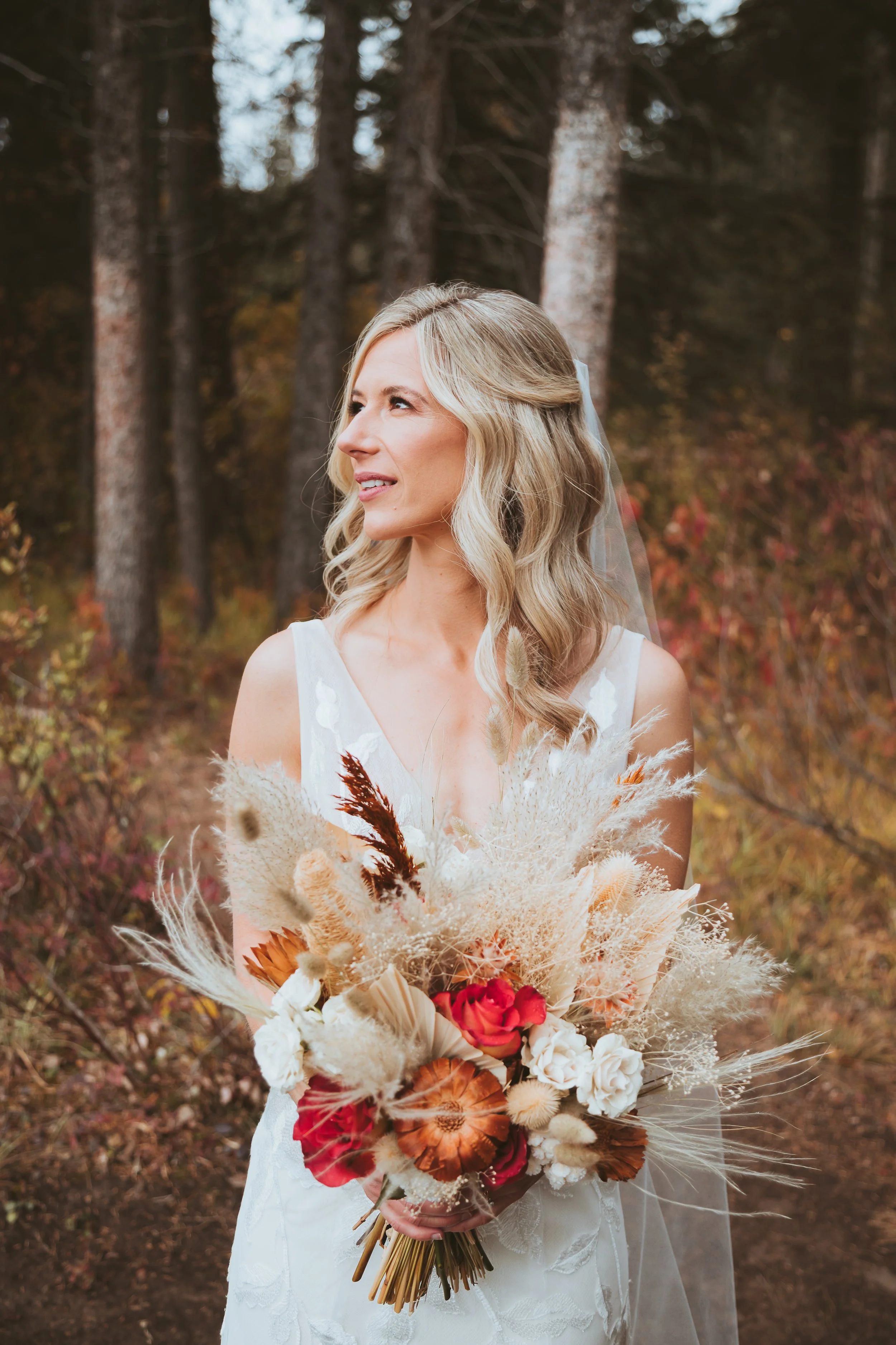 Elopement couple standing in Alberta's Rocky Mountains