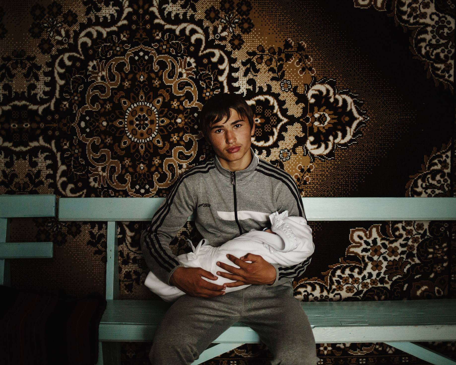  Djoltaï - A young boy and his brother after the baptism of the latter. 