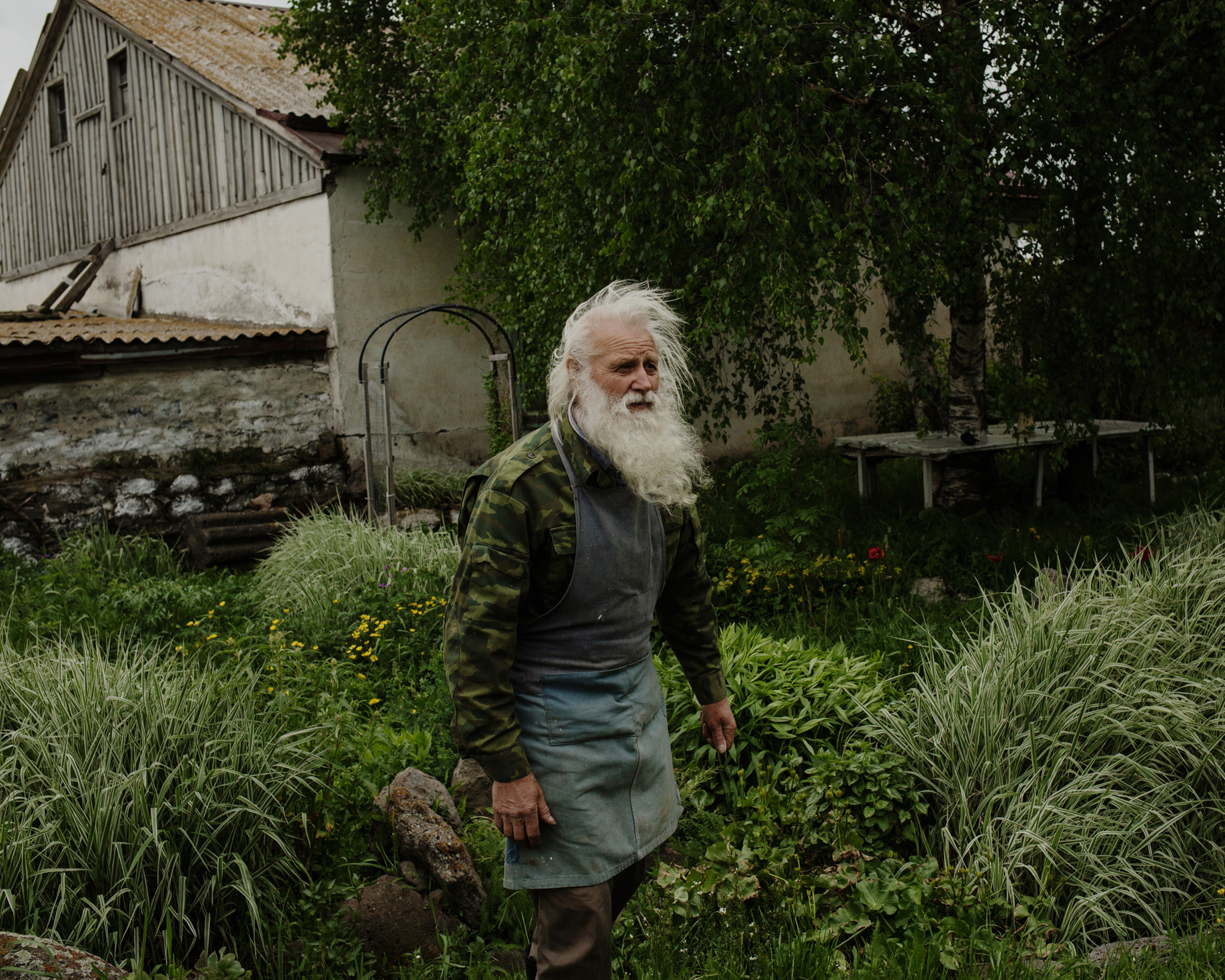  Nikolaï in the middle of his garden where he raises hundreds of different kind of herbs and flowers. He uses it for eating and traditional medicine. Doukhobors are know for their traditional way of life. 