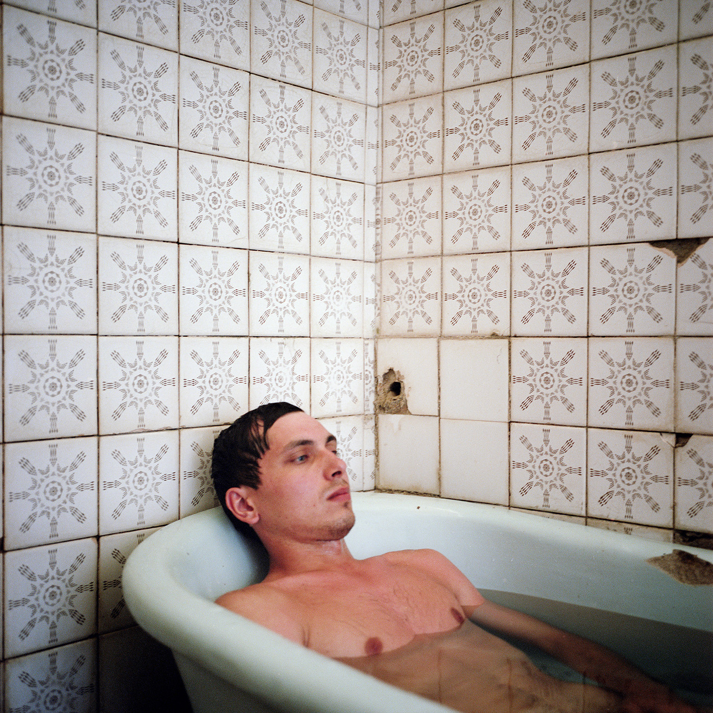  A Russian tourist takes a bath with sulfurous water in a sanitarium in Gagra. 