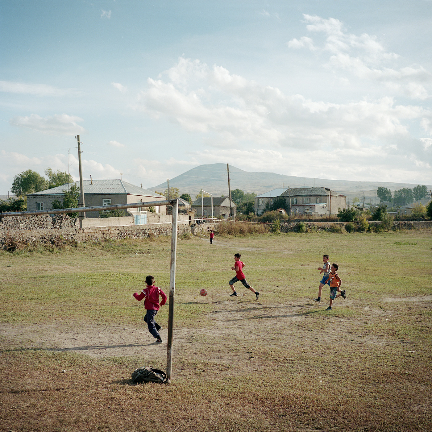  The football field of the village. There are no sports club in Lichk except boxing for boys and dance for girls, but children improvise games. 